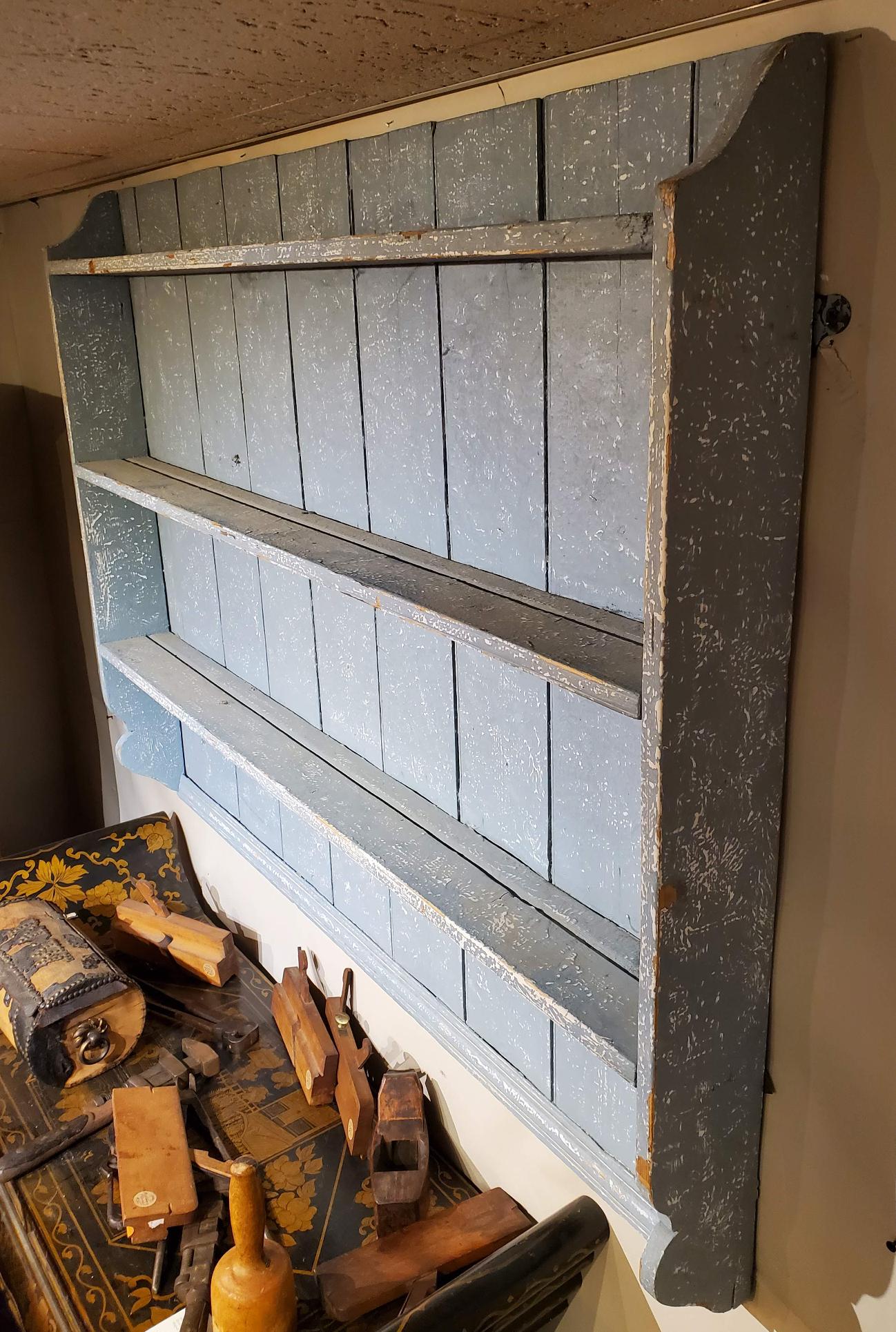 blue metal wall shelf