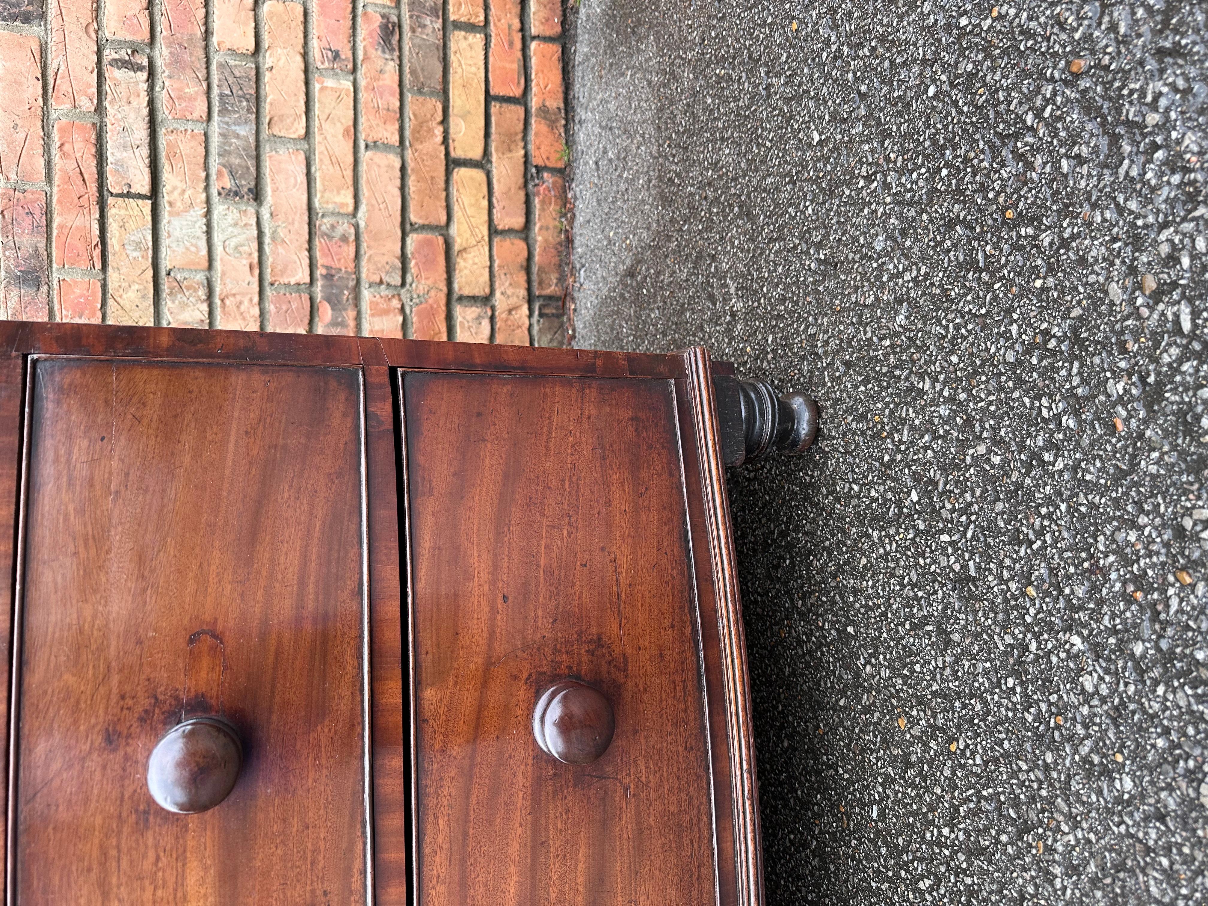 This is a beautiful English bow front chest. Dating to the 19th century this piece is still in excellent condition with stunning patina and such a smooth glossy finish. This chest is two over three with all drawers being spacious and smoothly