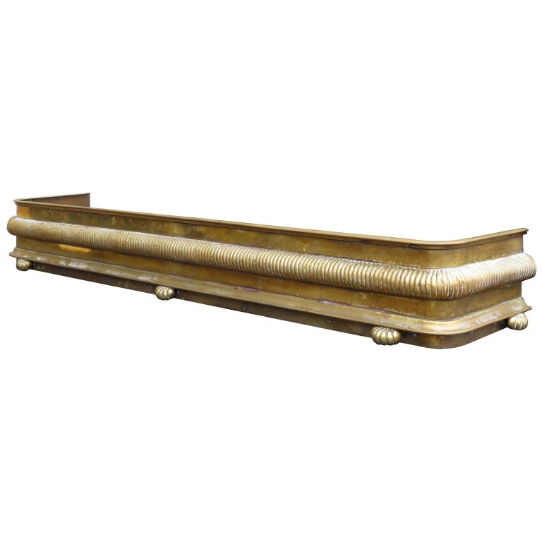 19th Century English Brass Fireplace Fender With Melon Feet For