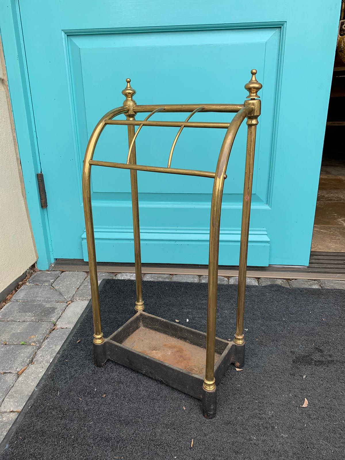 19th century English brass and iron umbrella stand, curved top.