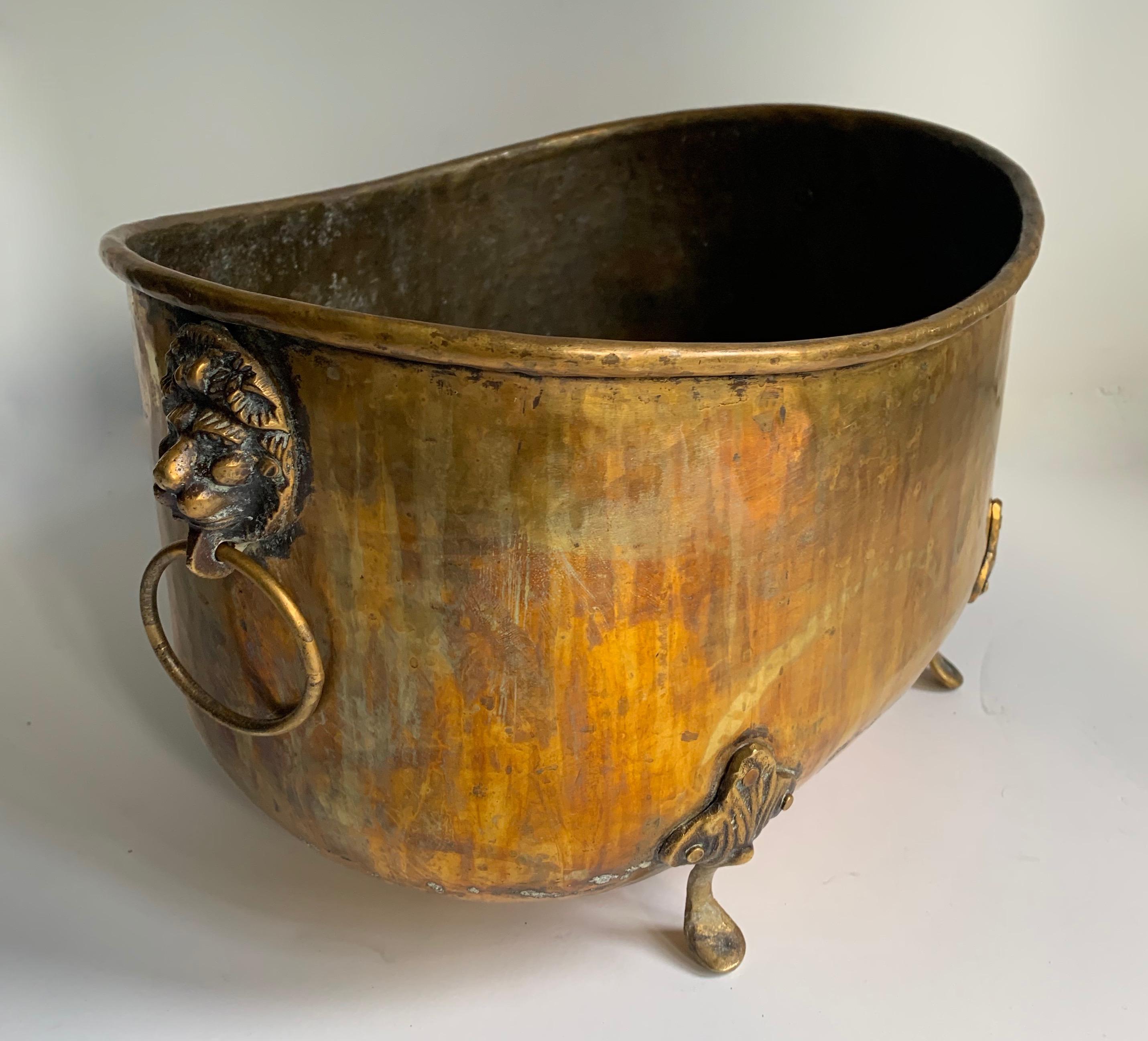 19th century brass jardinière planter with lion handles - The patina is exquisite! A wonderful compliment to any table or desk. Useful as a decorative planter / jardinière, or for magazines and mail.