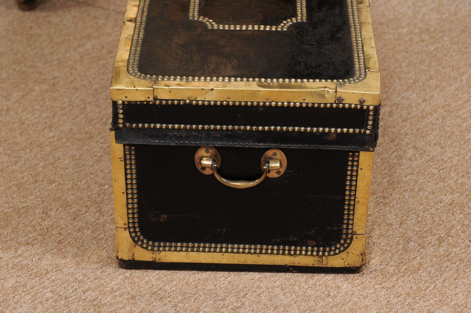 19th Century English brass studded leather trunk.