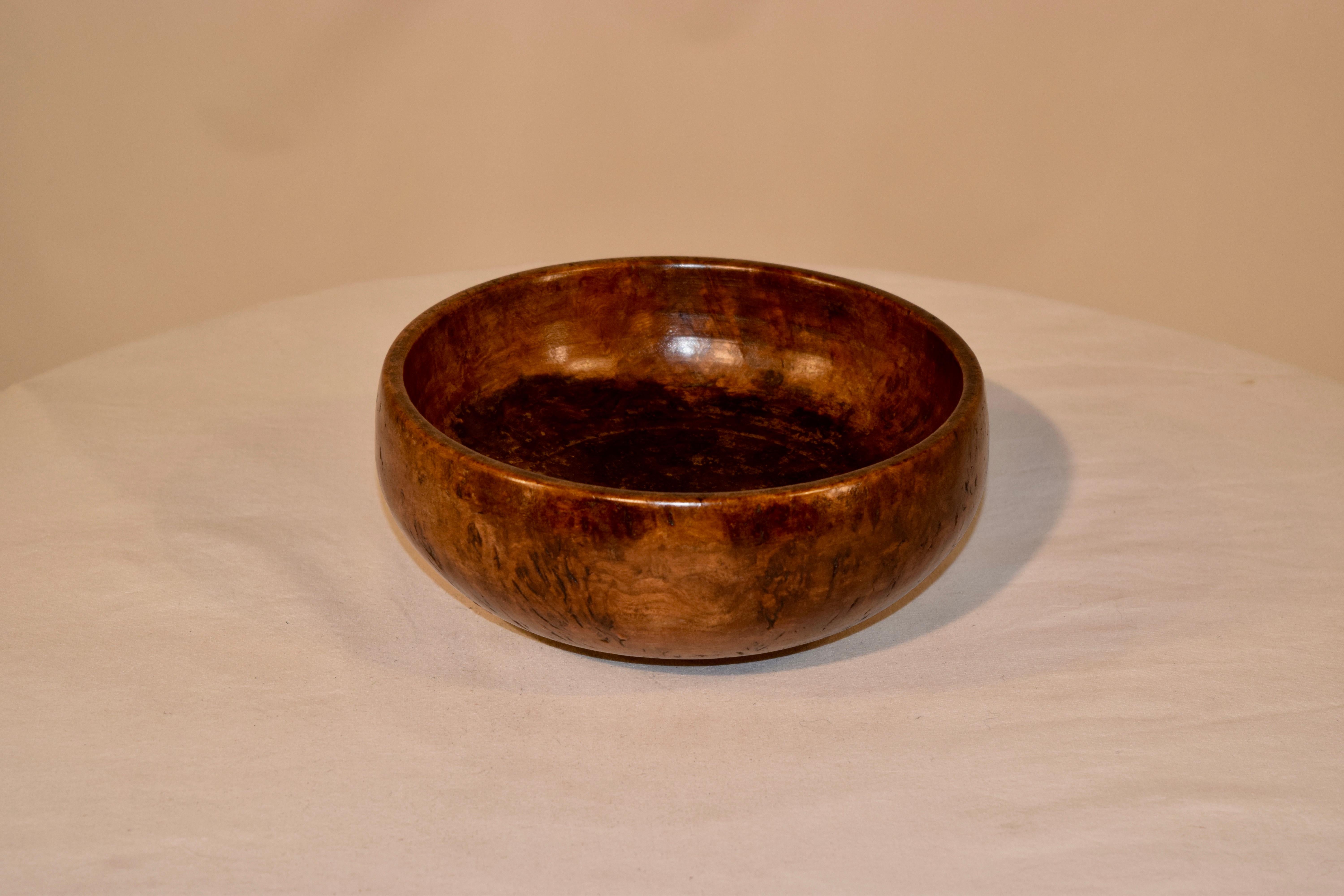 19th century English hand turned bowl made from burl walnut. Stains on interior from age and use.