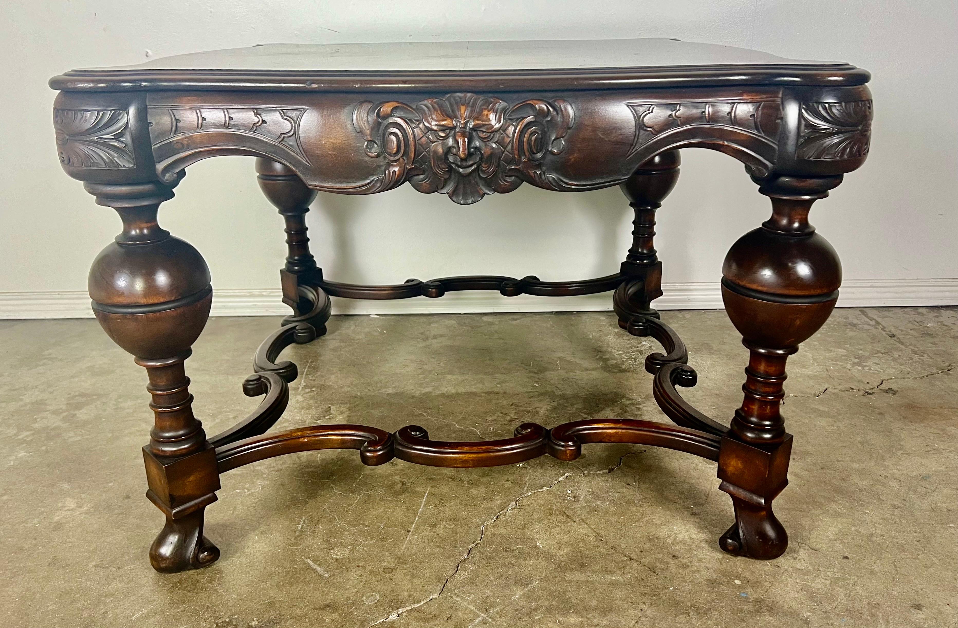 19th Century Baroque English coffee table in burl walnut, featuring beautifully turned legs and intricate carved detail.   The design reflects the elegance and craftsmanship of the Baroque era.