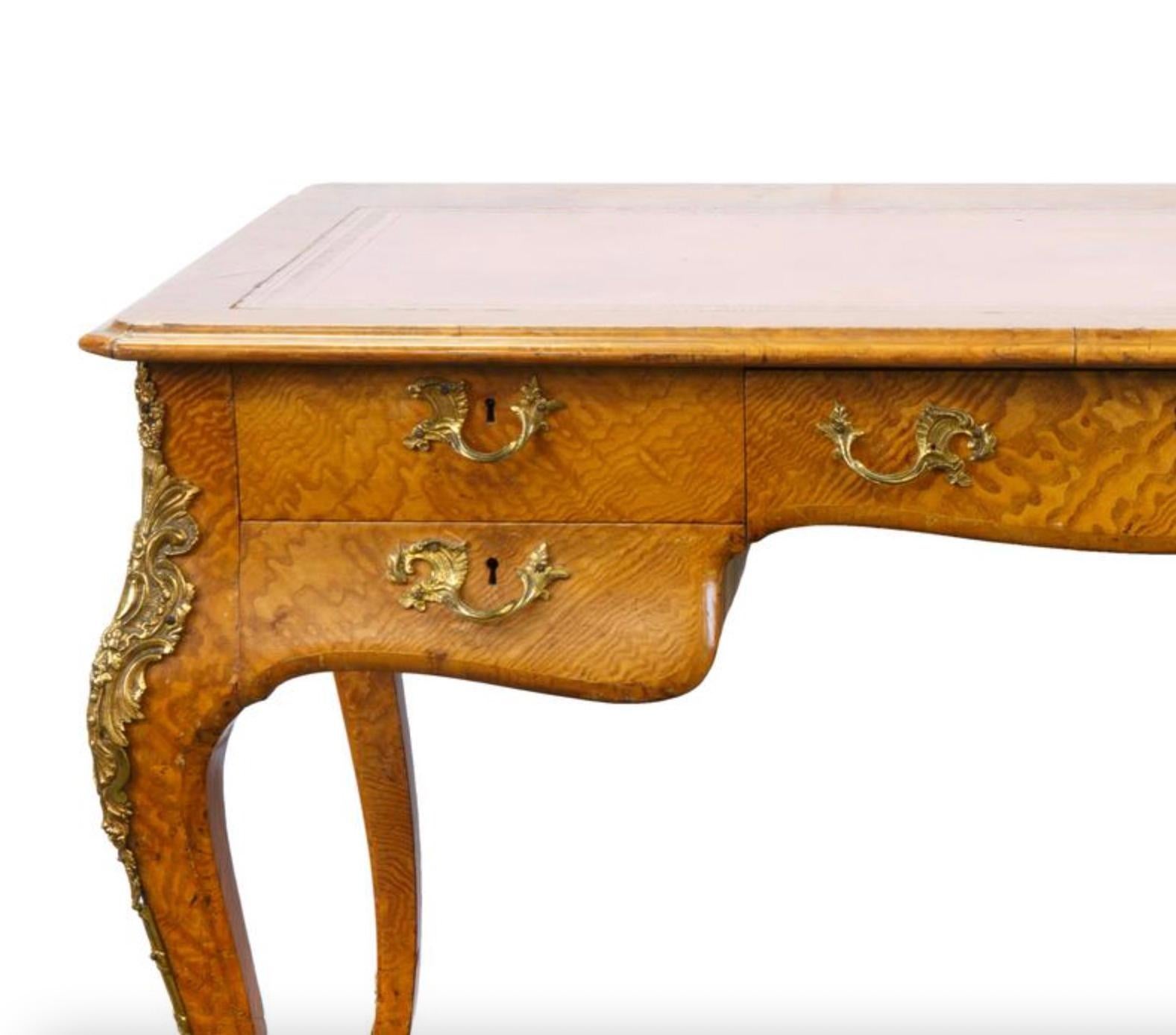 Elevate your study room / workspace with this Exquisite Howard and Sons Burl Walnut Lacquered Writing Desk, a masterpiece of design, craftsmanship, and fine details. The burl walnut wood and gilt bronze floral decorations create a sense of