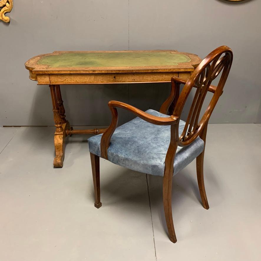 This really is an outstandingly good quality 19th century English burr walnut writing table with marquetry, box stringing and fine brass mounts, finished with a fabulous sage green and gilt tooled leather top.
The colour to this piece is really