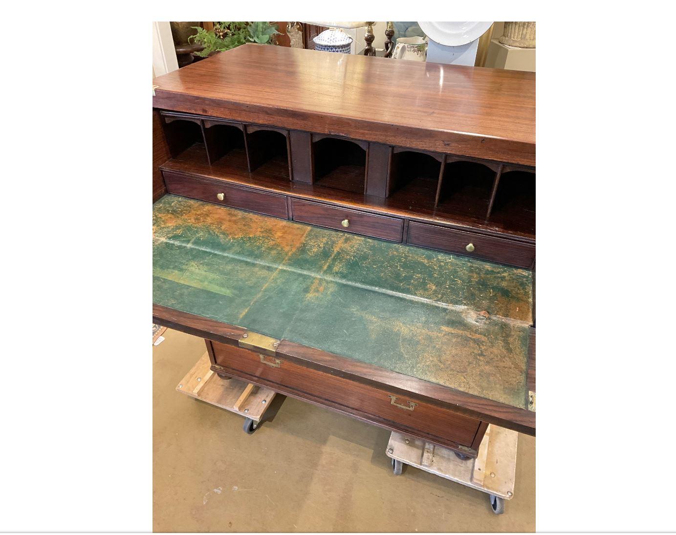This 19th century campaign chest would make a perfect addition to a bedroom, office, or even living room! This chest is larger than many and has lovely patina The classic campaign style brass handles give this piece a unique look different from