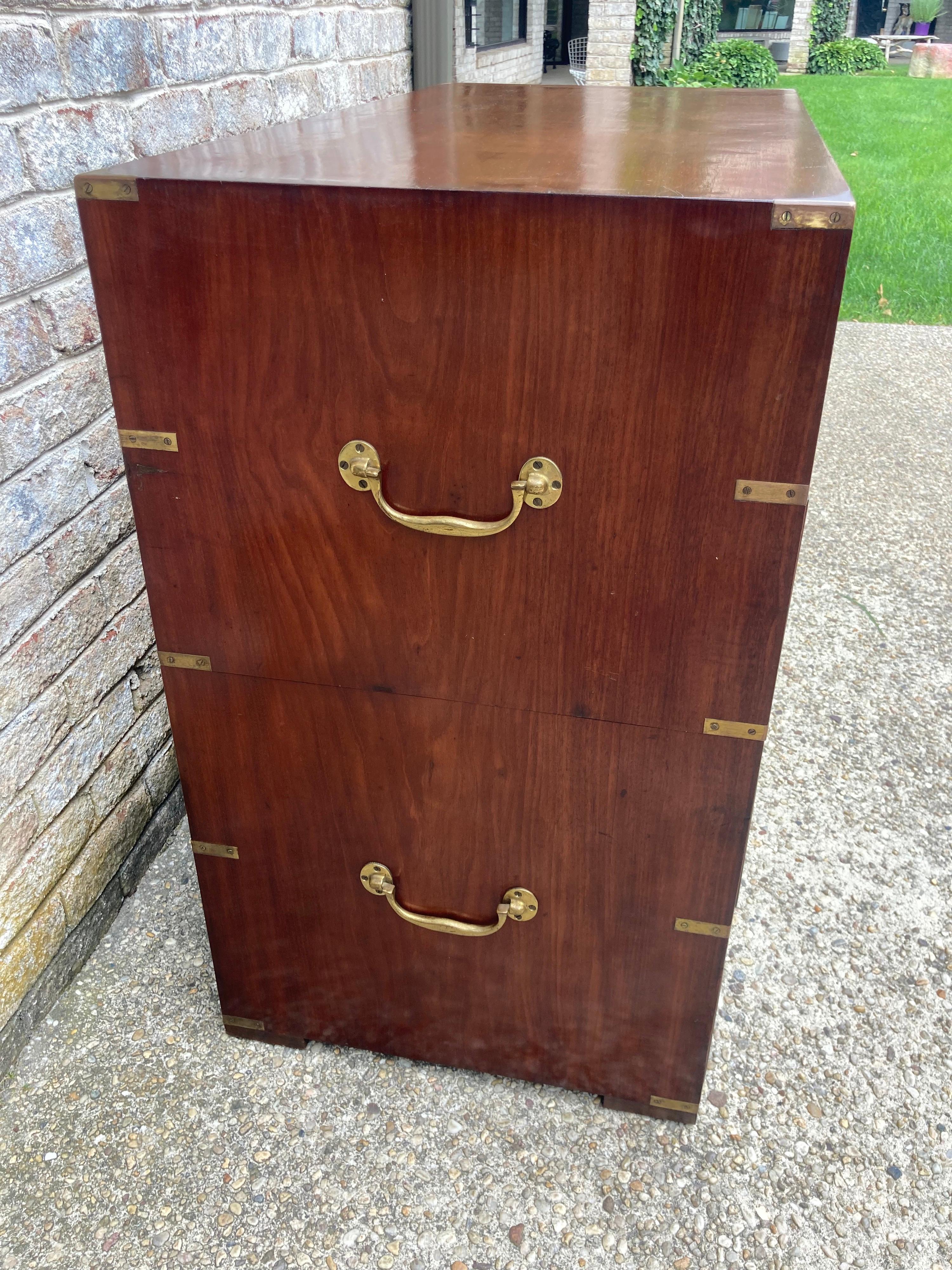 English two piece campaign chest with brass fittings... three large drawers with two on top....
