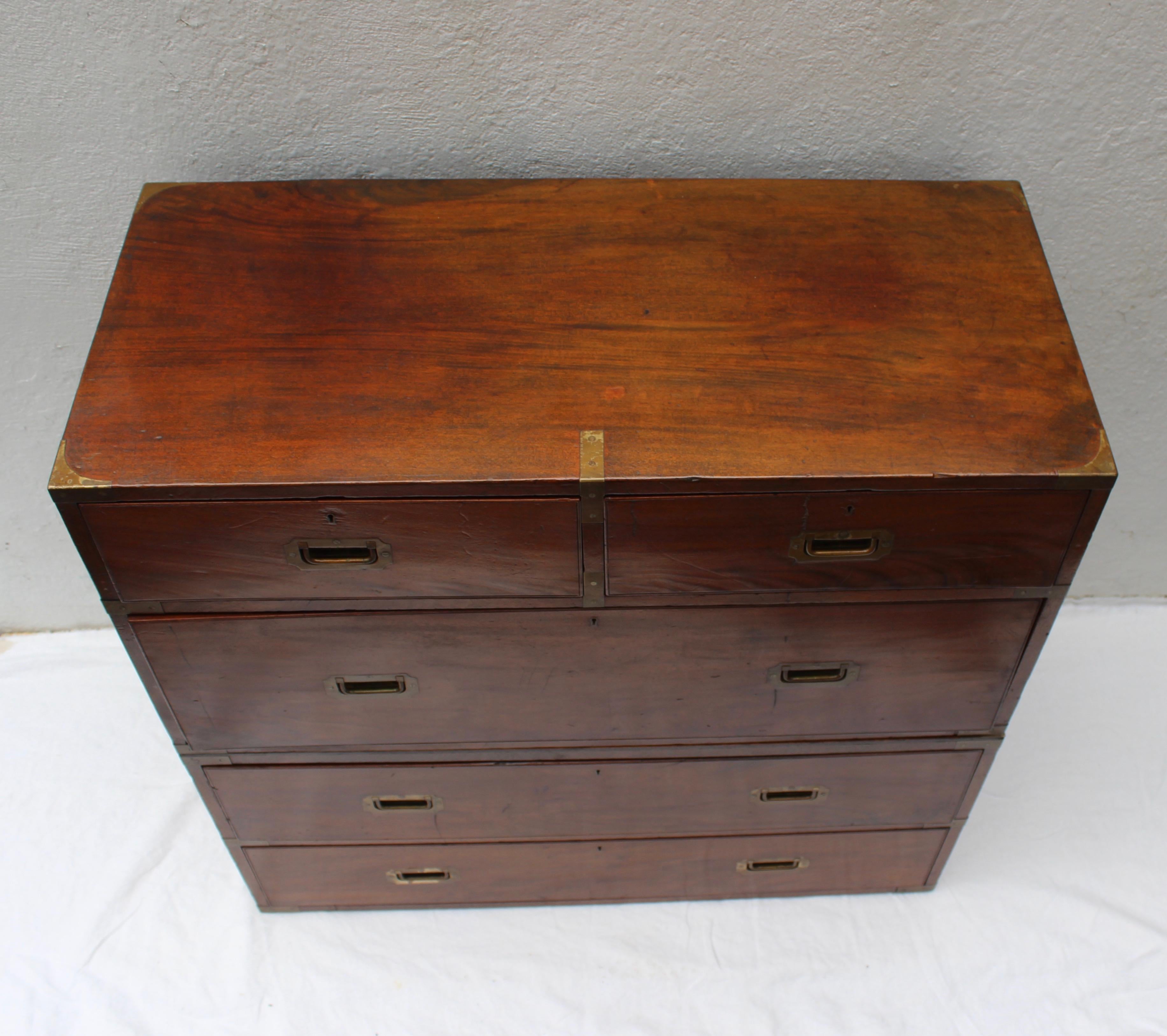 19th century English two-part campaign chest. Lower part is finished on top so that both pieces could be separated to make nightstands with new iron bases.