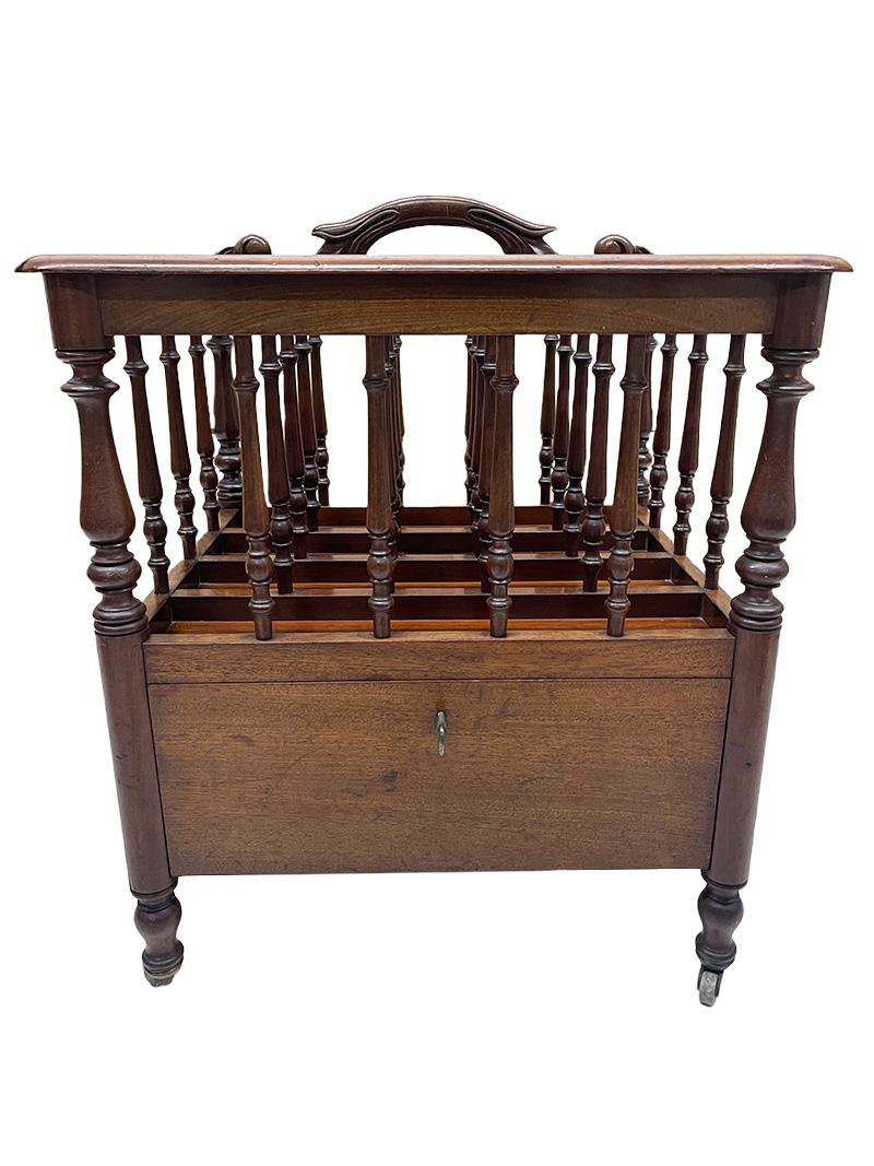 19th century English  Canterbury

A Canterbury in mahogany wood with four divisions and a drawer, raised on legs with brass castors.
Made in England in the 19th Century, between 1820-1840. Key present and working
The Canterbury measures 49 cm high