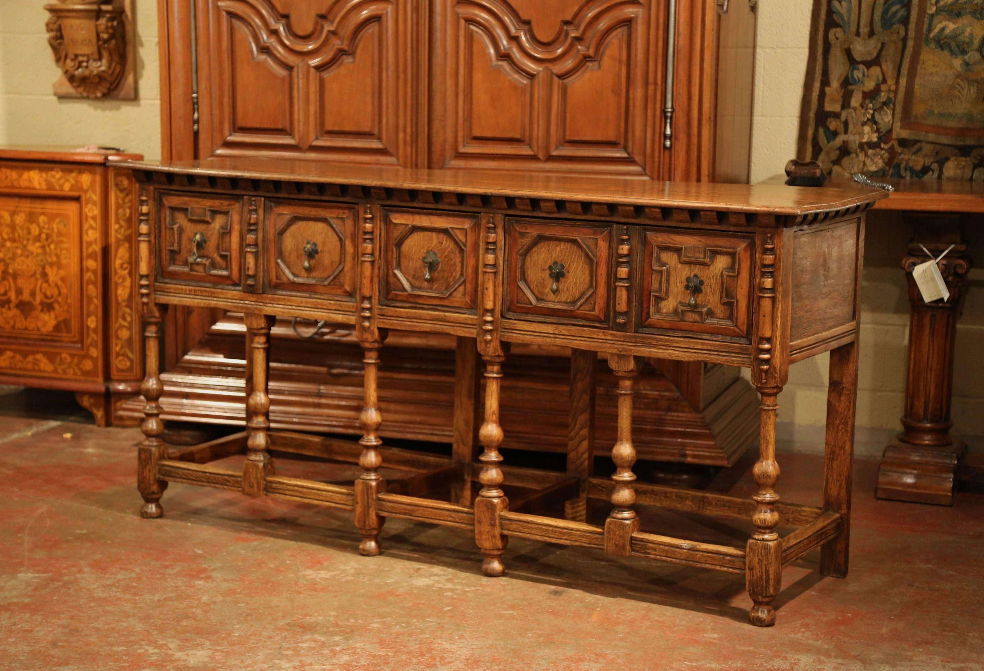 Jacobean 19th Century English Carved Chestnut and Oak Eight-Leg Console Table and Drawers