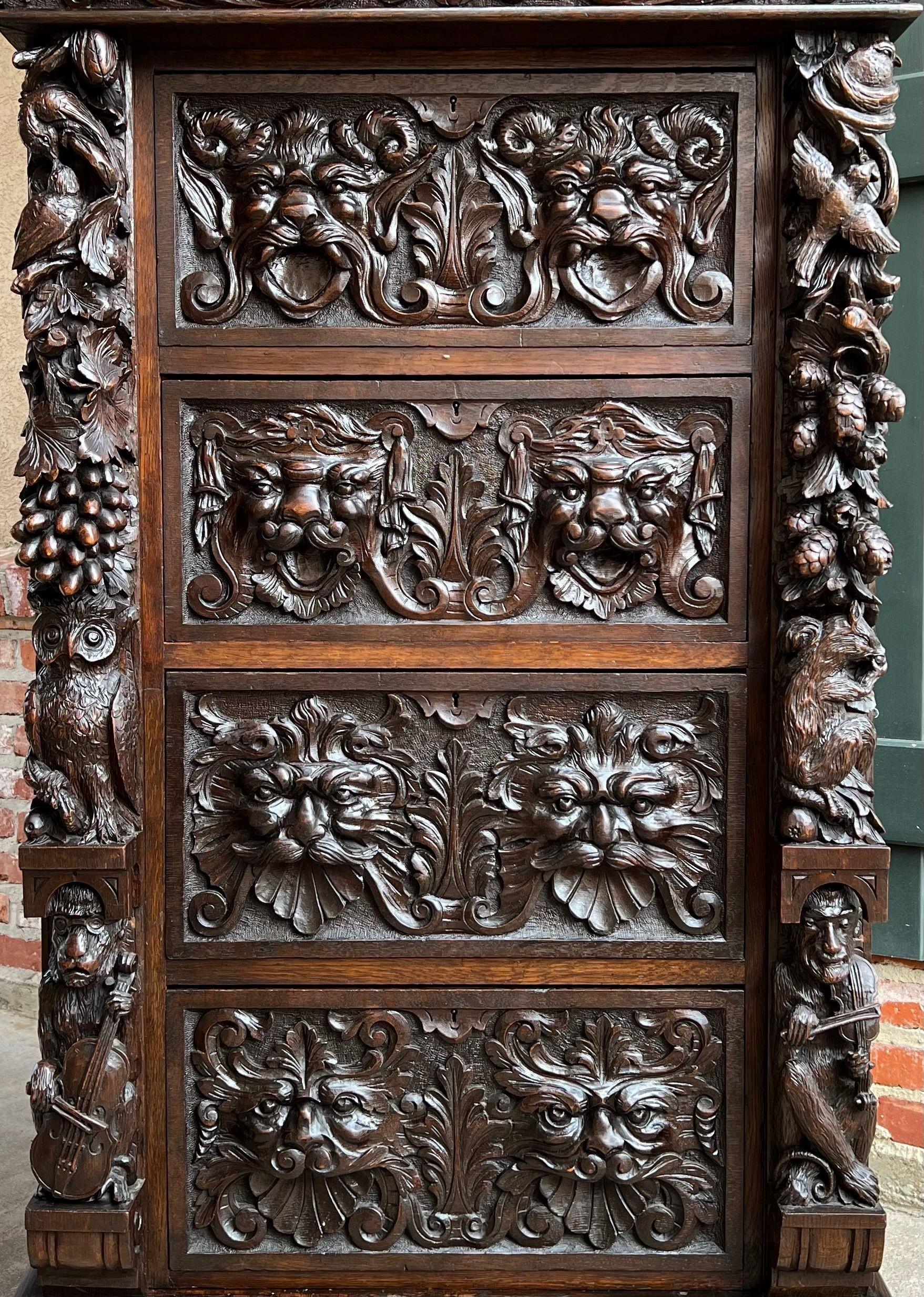 Hand-Carved 19th Century English Carved Oak Chest Cabinet Gothic Revival Monkey Owl Violin