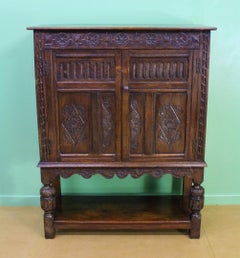 19th Century English Carved Oak Cupboard