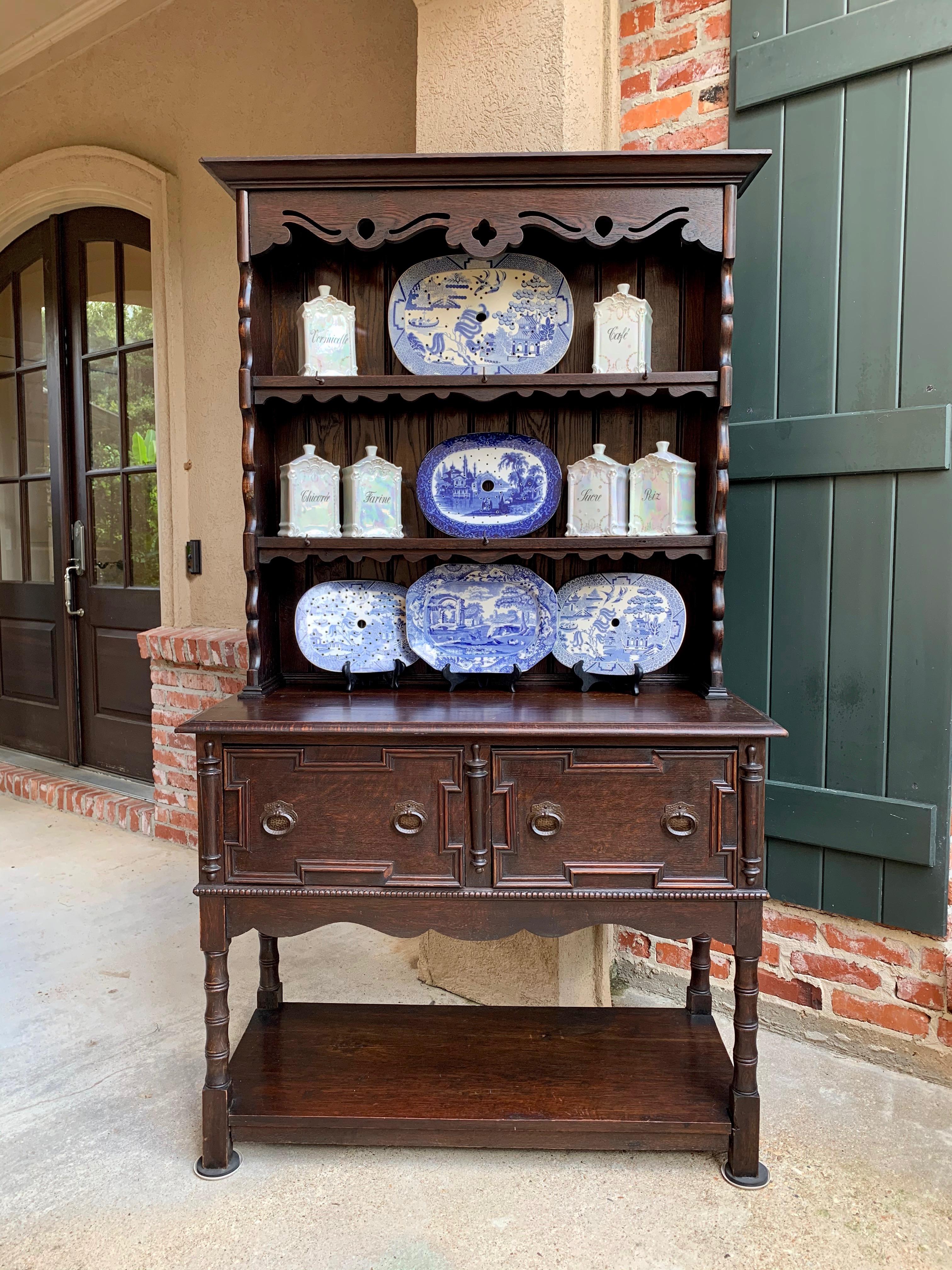 ~Direct from England~
Always a classic, this proper antique English “welsh dresser” or sideboard blends perfectly with every style, and provides an abundance of display and storage area.
The smaller size makes it suitable for a variety of places
