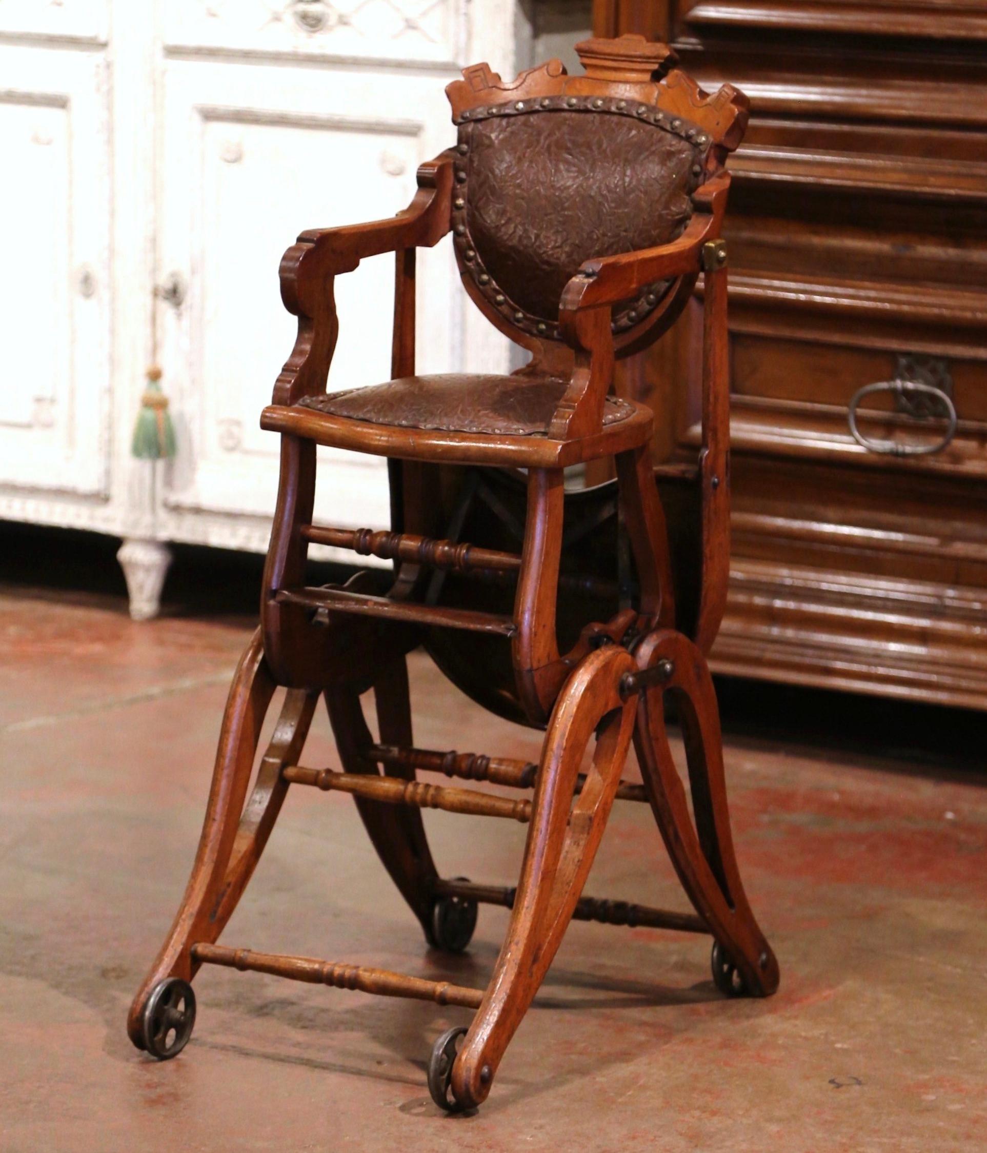 Victorian 19th Century English Carved Walnut and Leather Adjustable High Chair Rocker