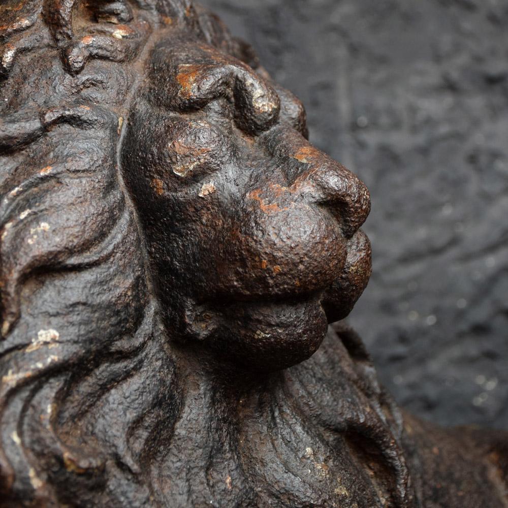 19th century cast iron lion door stop

Rare 19th century cast iron lion doorstop, this wonderful decorative Victorian cast iron flat back reclining lion example is an elegant doorstop, probably after the magnificent original bronze pair by Sir