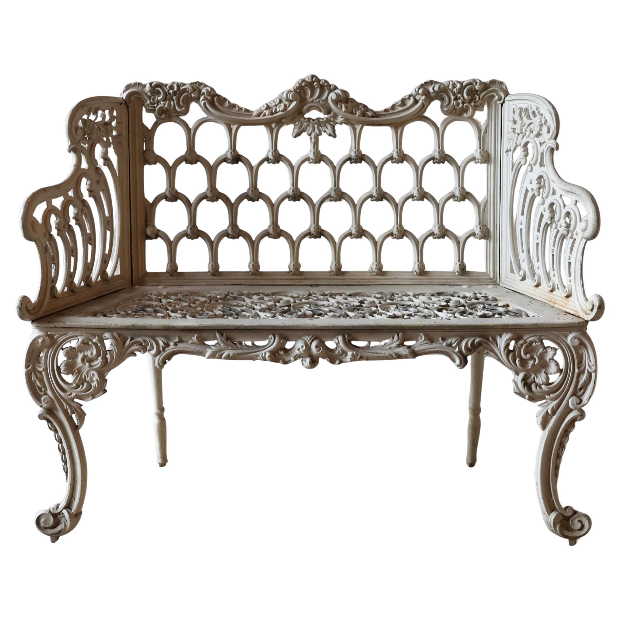 Banco de jardín "Love Seat" inglés de hierro fundido del siglo XIX