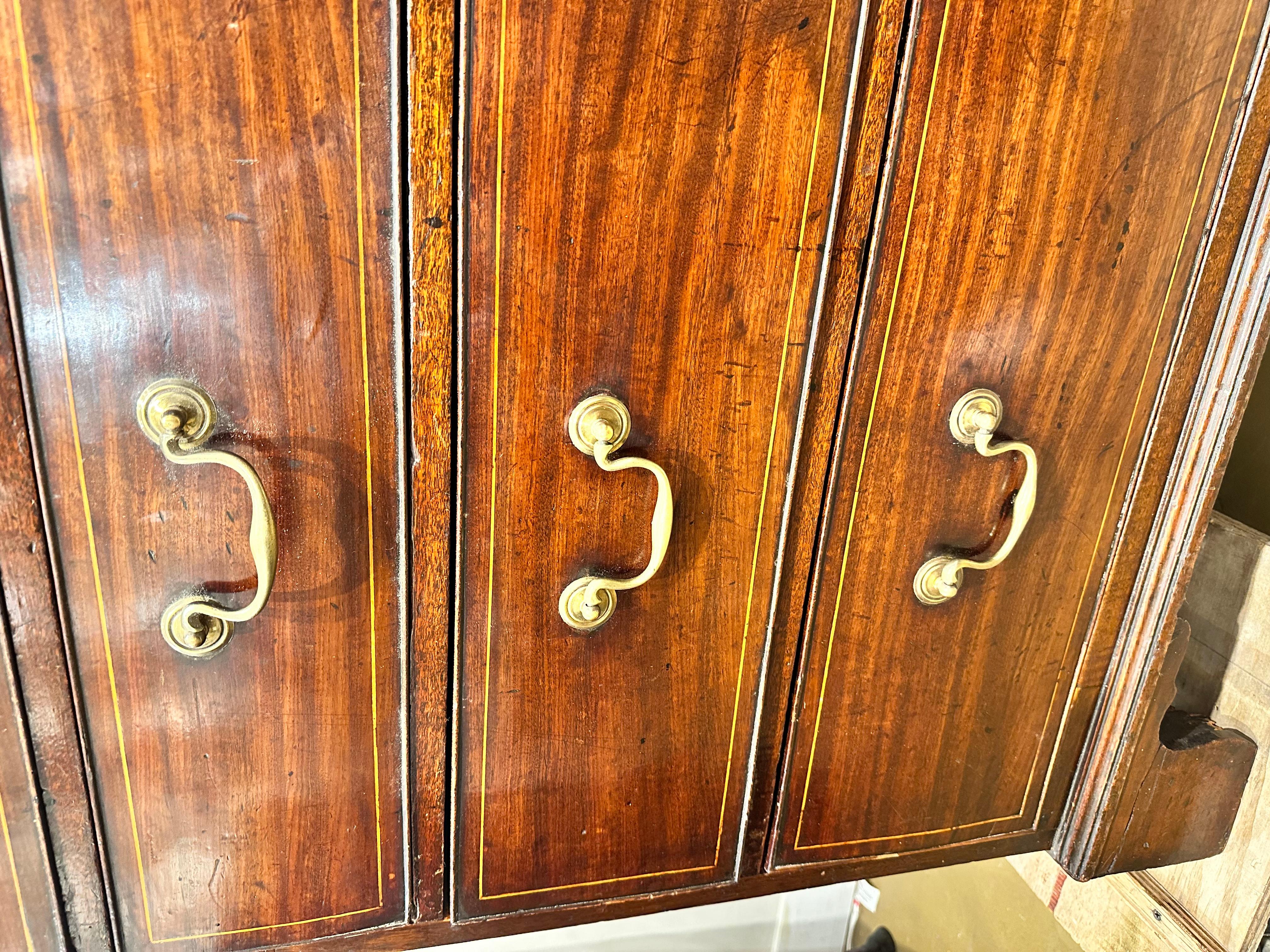 This is a beautiful 19th century chest of drawers! Two over three, and very square design, this piece has a masculine yet attractive style to it. It has rich patina and high gloss with horizontal natural detail running across the drawers and top.