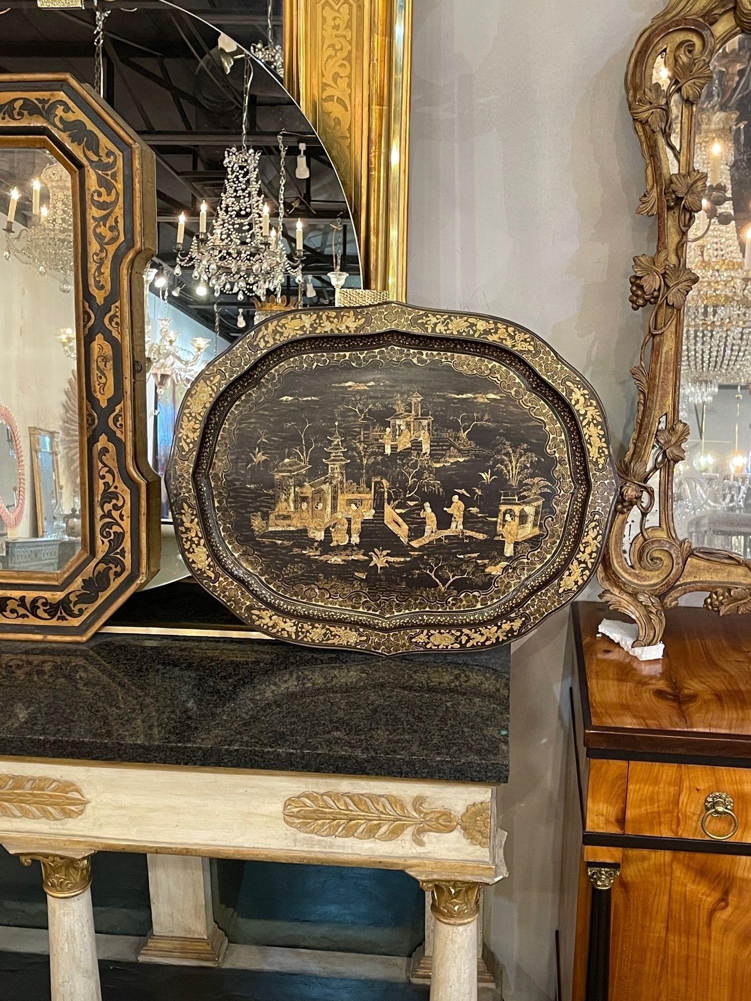 Very nice 19th century English Chinoiserie decorated paper mache tray. Lovely intricate design. A beautiful piece that makes a great accessory!