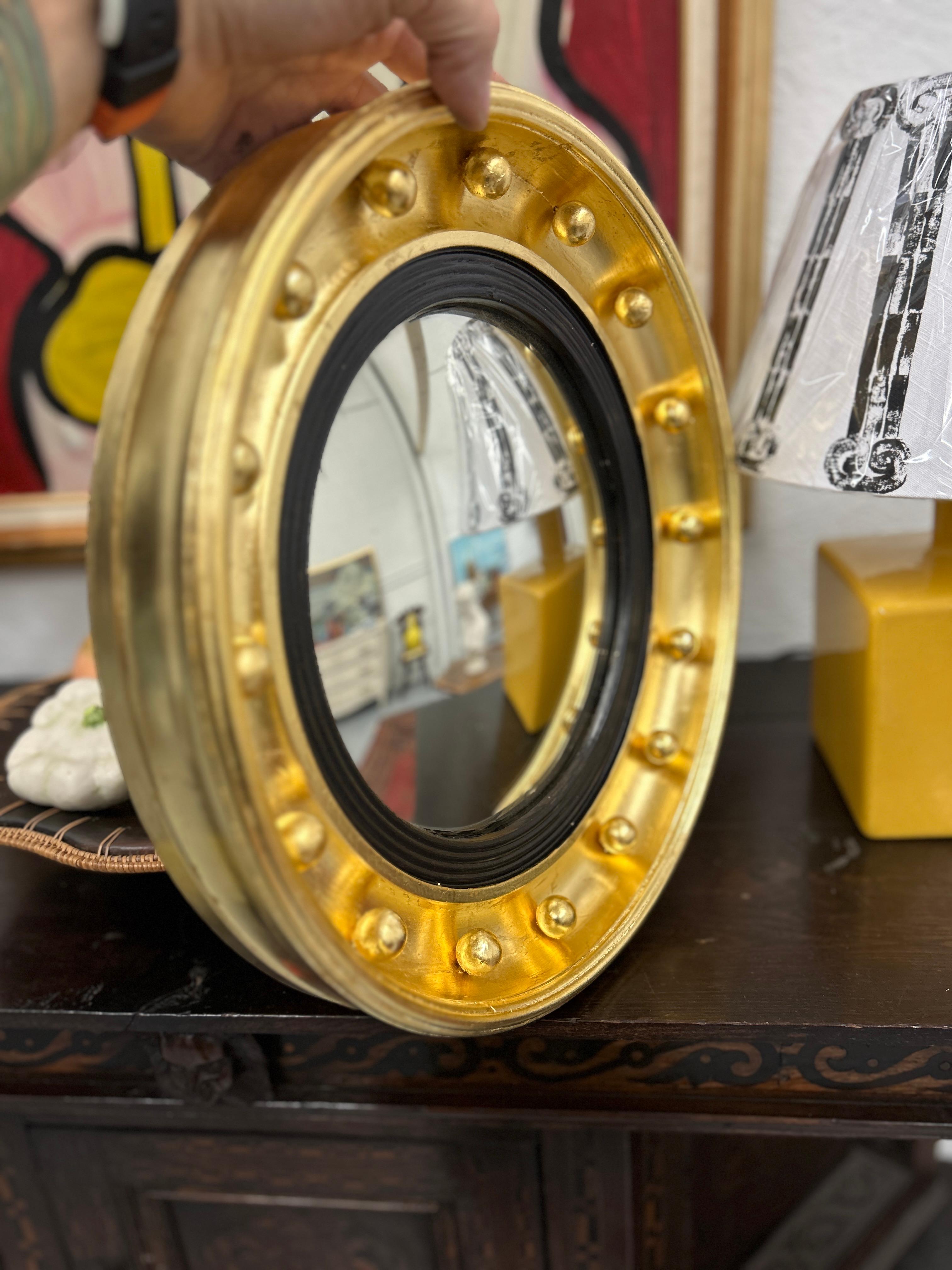 British 19th Century English Convex bullseye mirror in 23k gold leaf