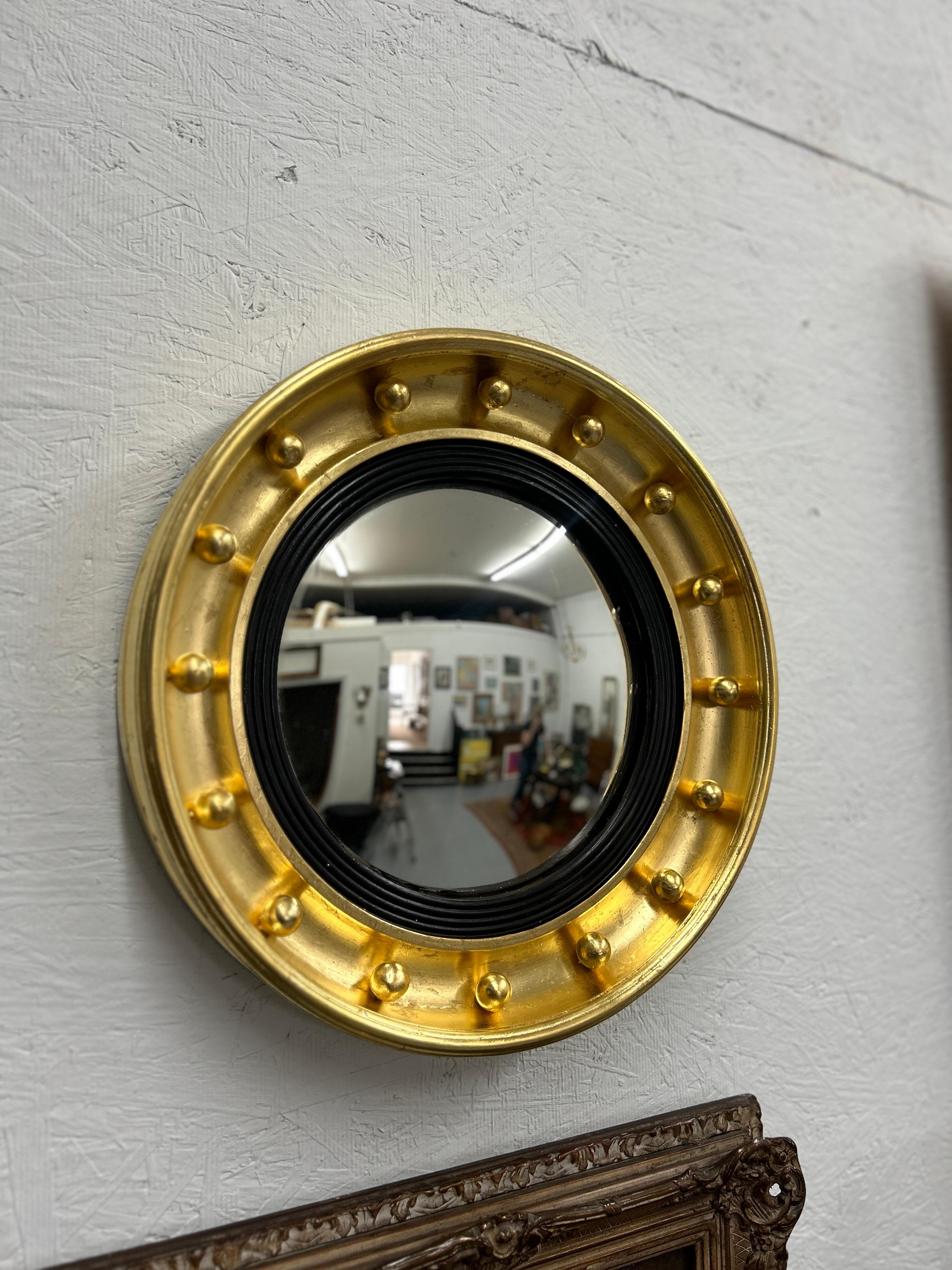 Gilt 19th Century English Convex bullseye mirror in 23k gold leaf