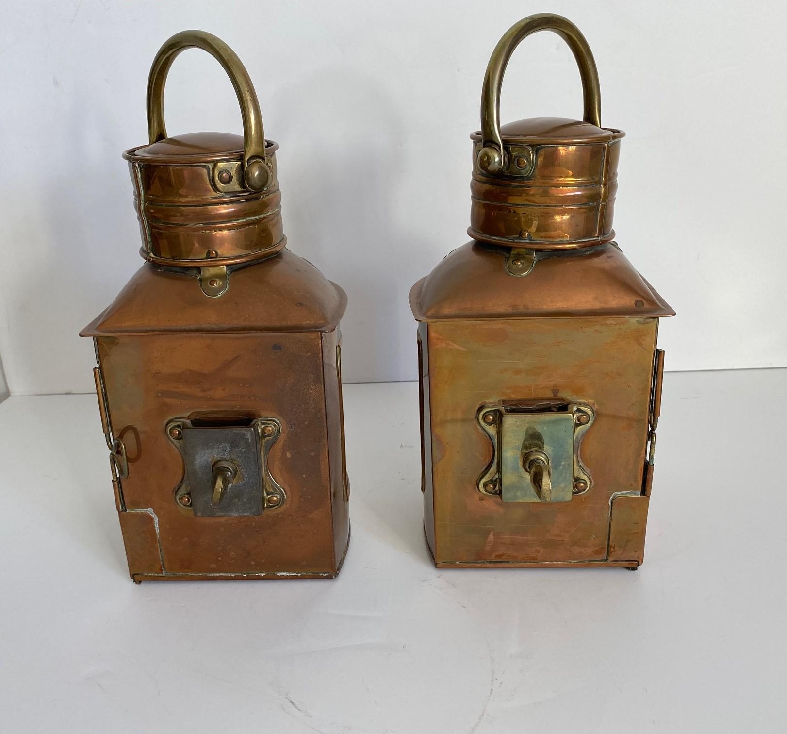 A pair of 19th-century copper ship lanterns. Original blue and red glass marked Port Starboard with brass accents.