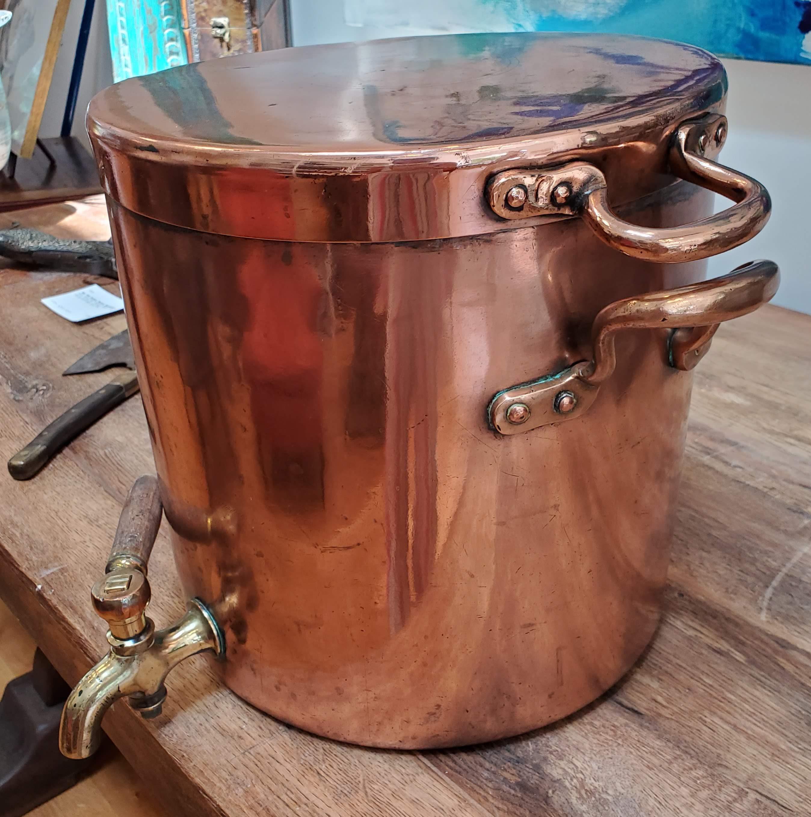 19th Century English Copper Water Dispenser with Brass Spout. Made for use on a ship. Perfect decor for a bar, tasting room, restaurant or large kitchen.
England, circa 1880.
Measures: 12” H 12.5” Dm.