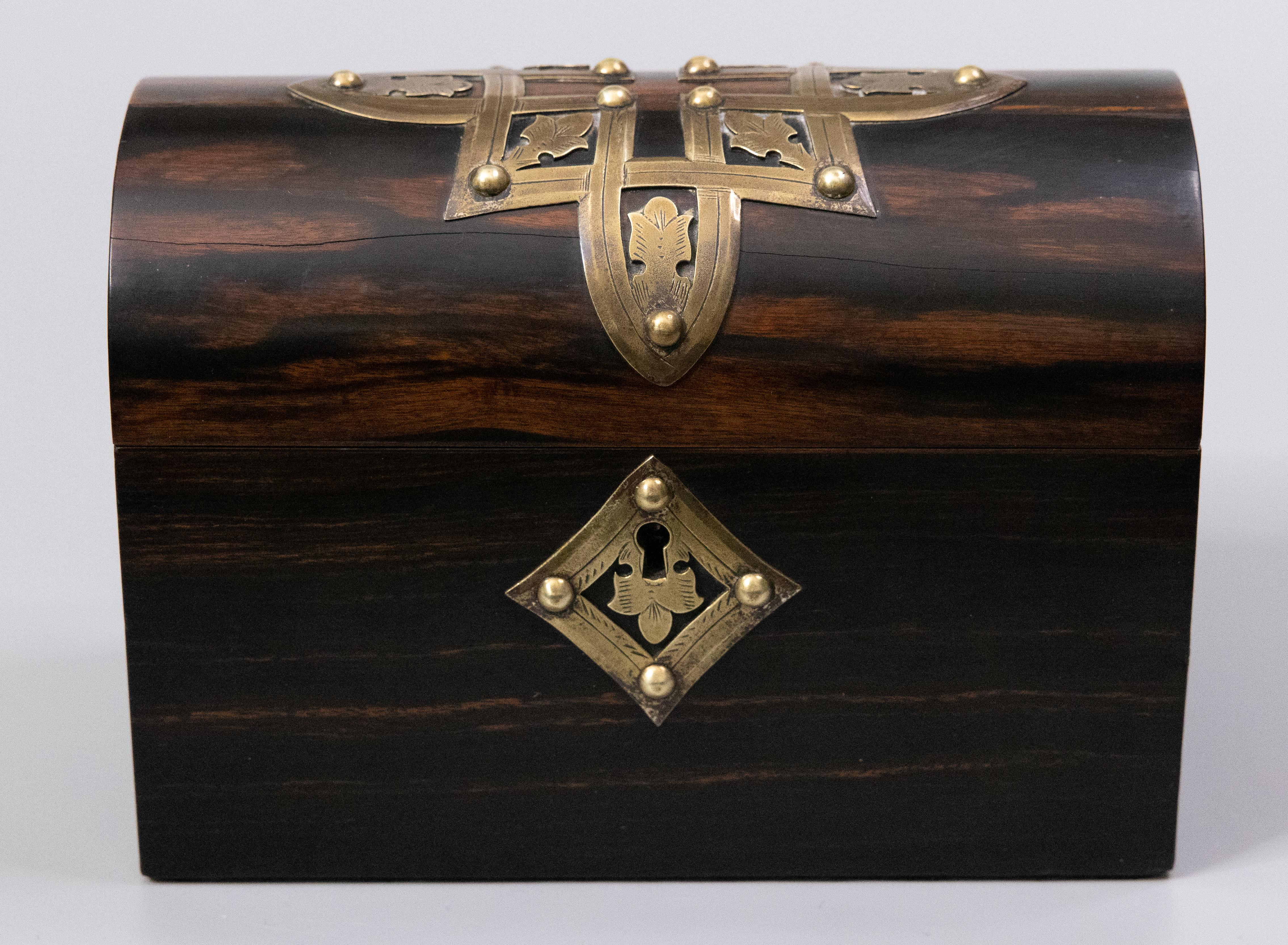 A superb antique English coromandel domed box with ornate brass mounts, circa 1870. This fine quality box is made of coromandel, a rare kind of ebony wood from Madagascar, highly sought after! The inner lid retains the original blue satin and the
