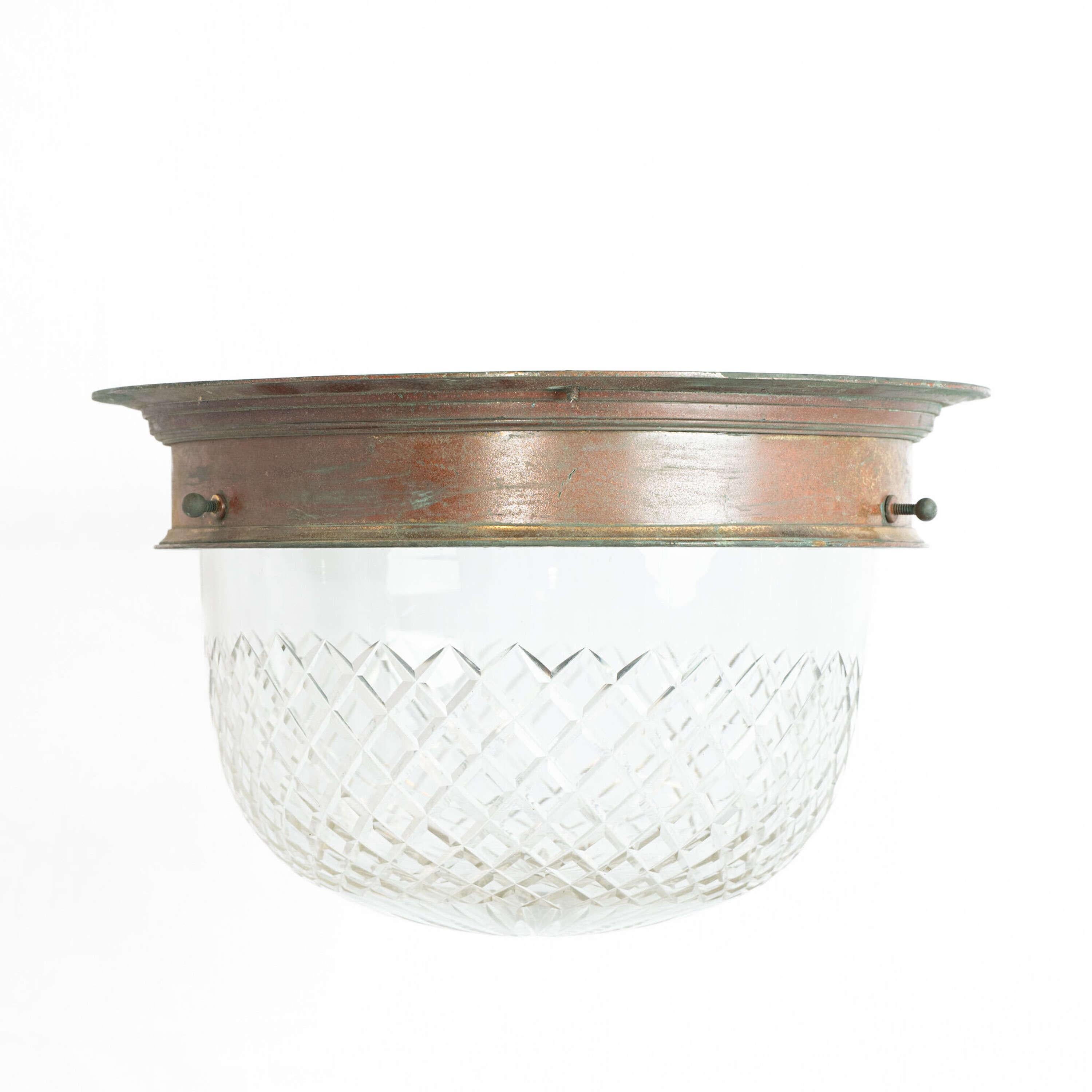 A 19th Century English cut glass ceiling light.
The bronze circlet, thick banded with lovely red tones coming through 
Height - 22 cm
Base Diameter- 37 cm
England , circa 1890
 

As with all our Plafonnier lighting, if longer or shorter chain is