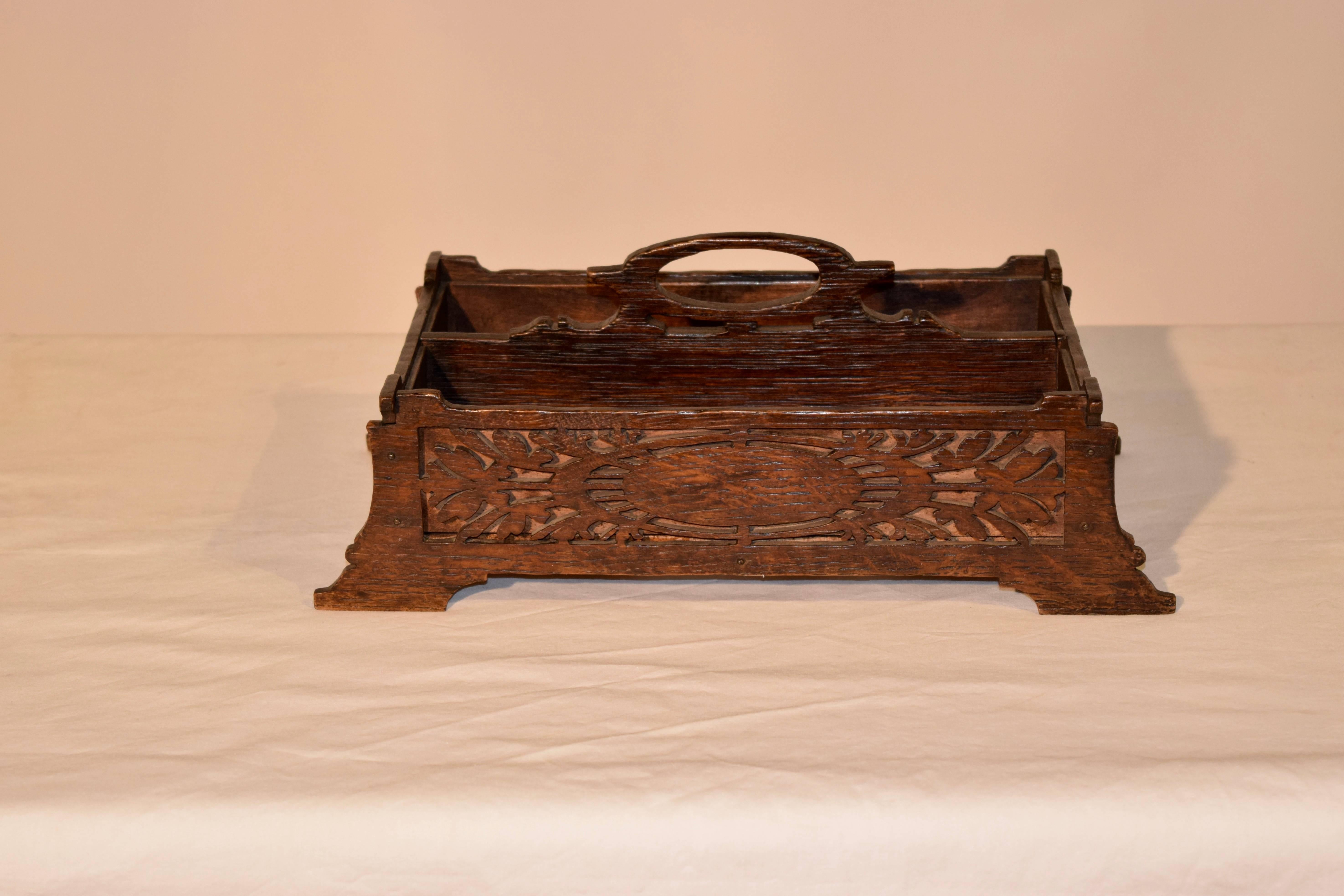 19th century English oak cutlery tray with hand pierced decoration and a felt lined interior.