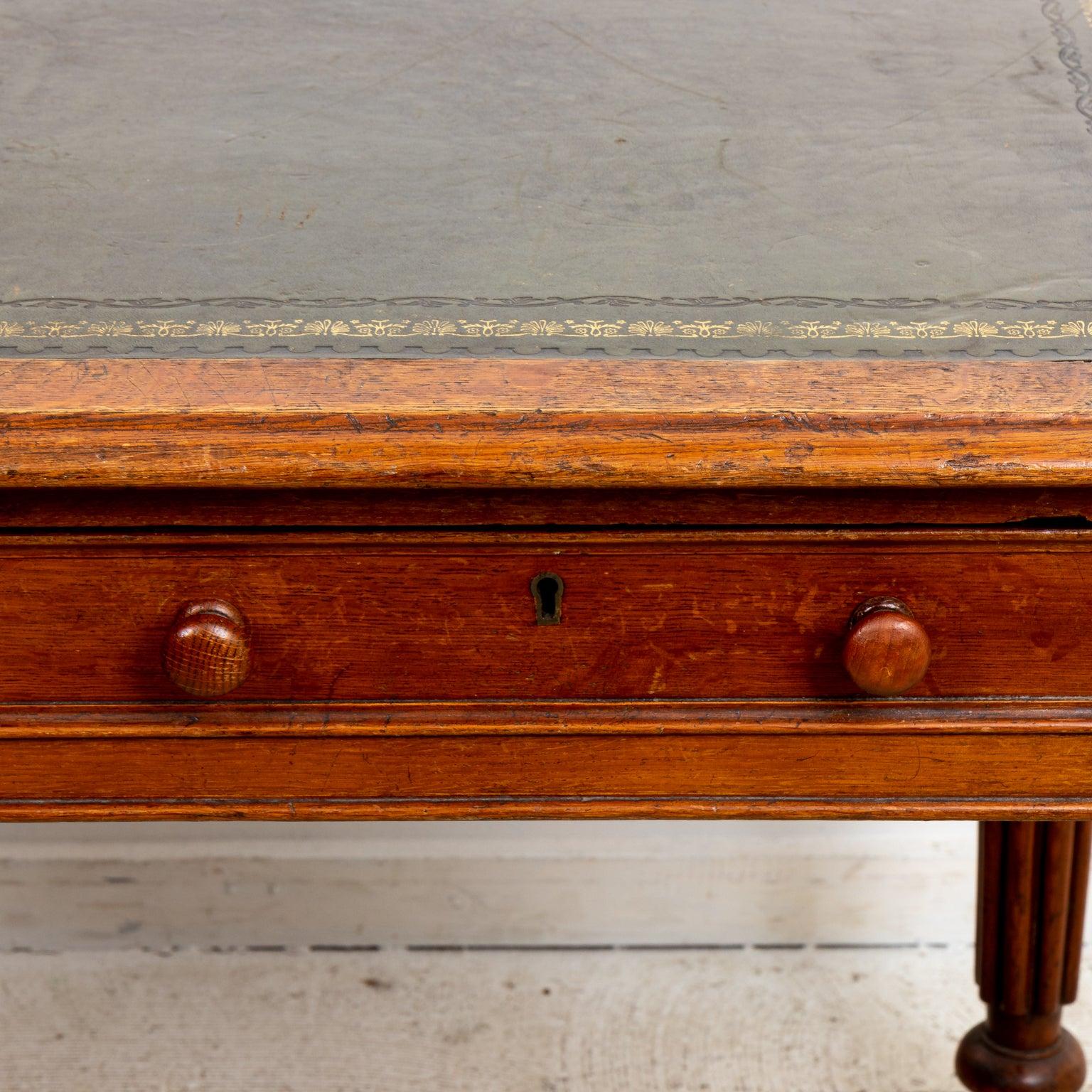 Leather top English desk, 19th century, signed Edwards & Roberts on drawer. Please note of wear consistent with age.