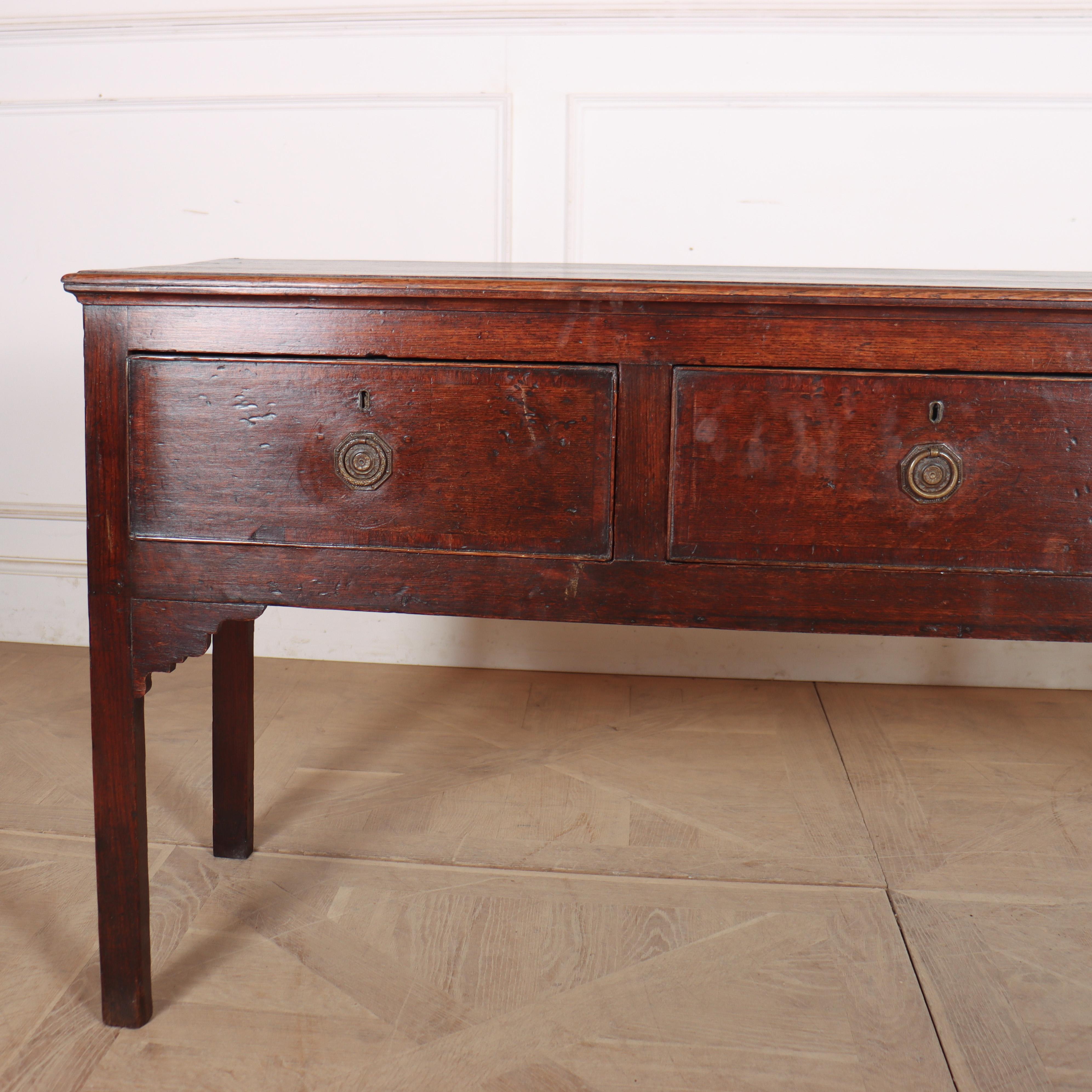 Early 19th century English three drawer oak dresser base with very good colour. 1810. 


Code: 8968

Dimensions:
W: 63.5