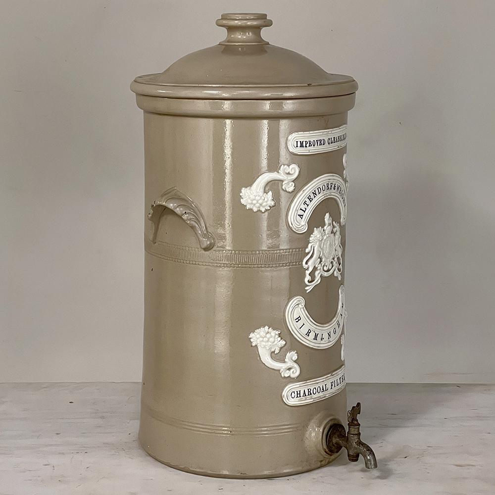 19th Century English earthenware water dispenser for charcoal filter is a marvelous example of the 