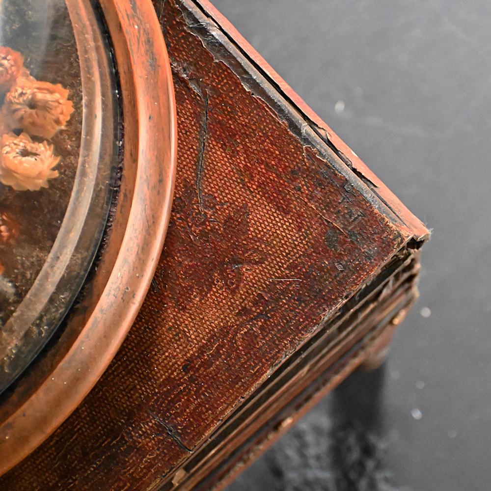 19th century English faux book box table

An honest leather four volume faux book box on painted pine stand with turned legs. Interior of the box lined with Italian marbleized paper and having a small, lidded compartment within. Made in England