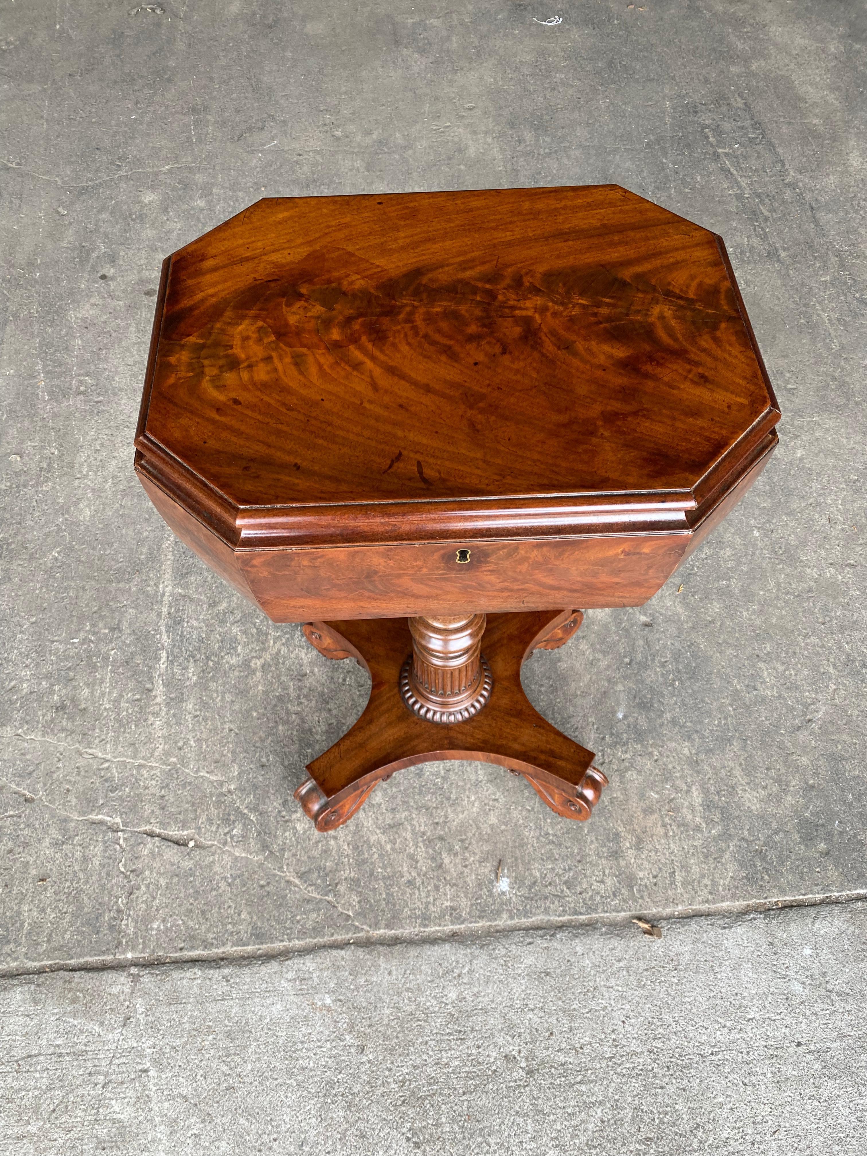 19th century English figured mahogany teapoy side table, finely carved base and feet. Great color. Size is perfect as a side or end table.