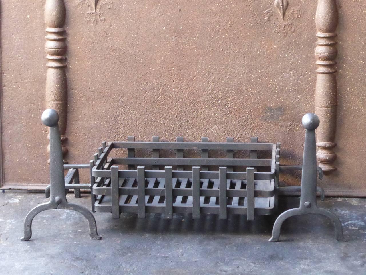 19th century English fire grate made of wrought iron.