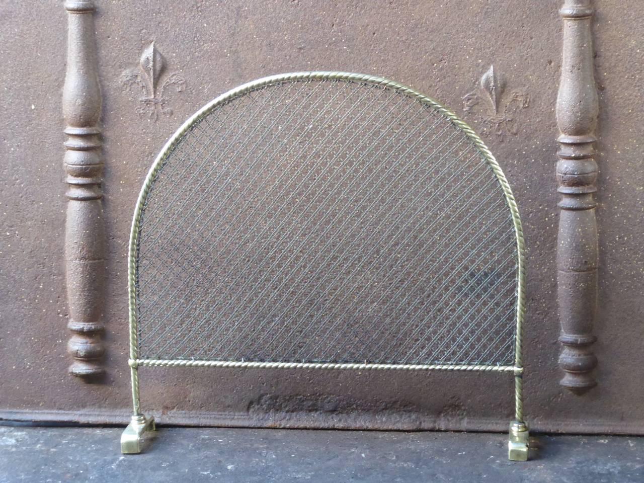 19th century English Victorian firescreen made of polished brass and iron mesh.

We have a unique and specialized collection of antique and used fireplace accessories consisting of more than 1000 listings at 1stdibs. Amongst others, we always have