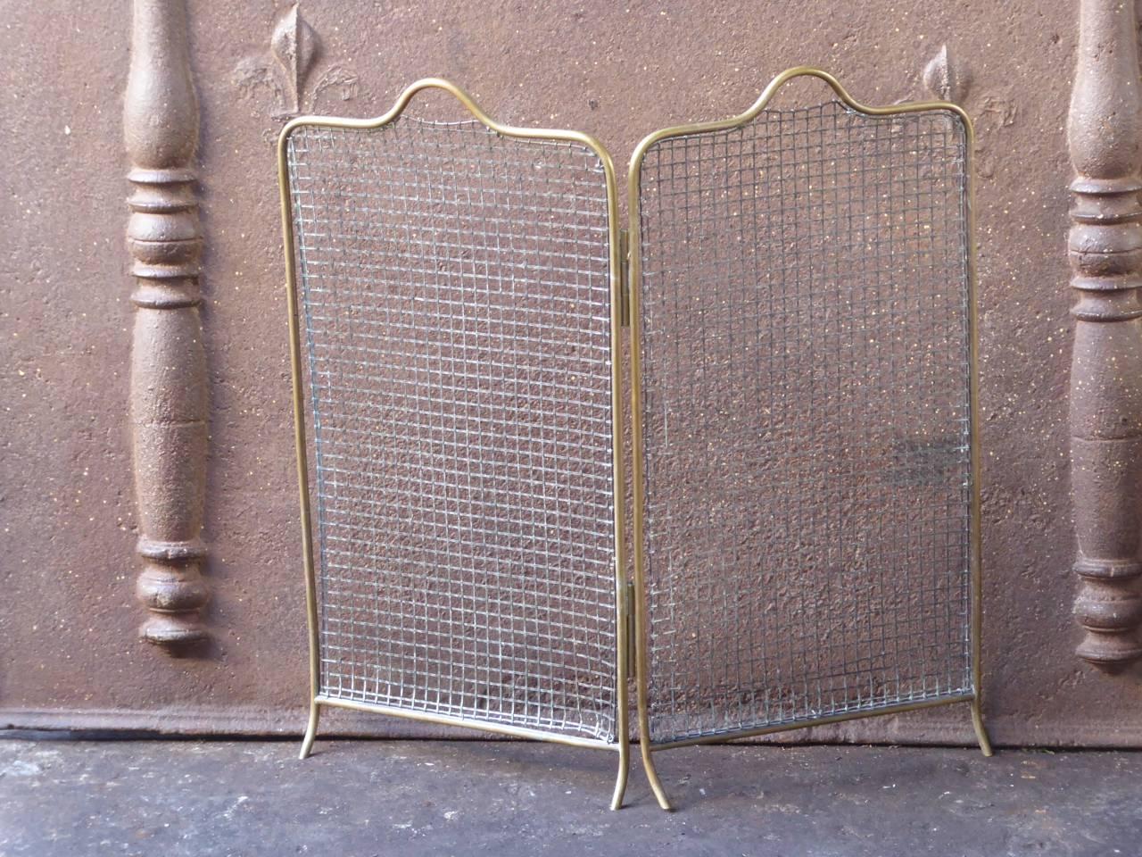 19th century English Victorian fireplace screen made of brass and iron mesh. The screen has two panels.

We have a unique and specialized collection of antique and used fireplace accessories consisting of more than 1000 listings at 1stdibs. Amongst