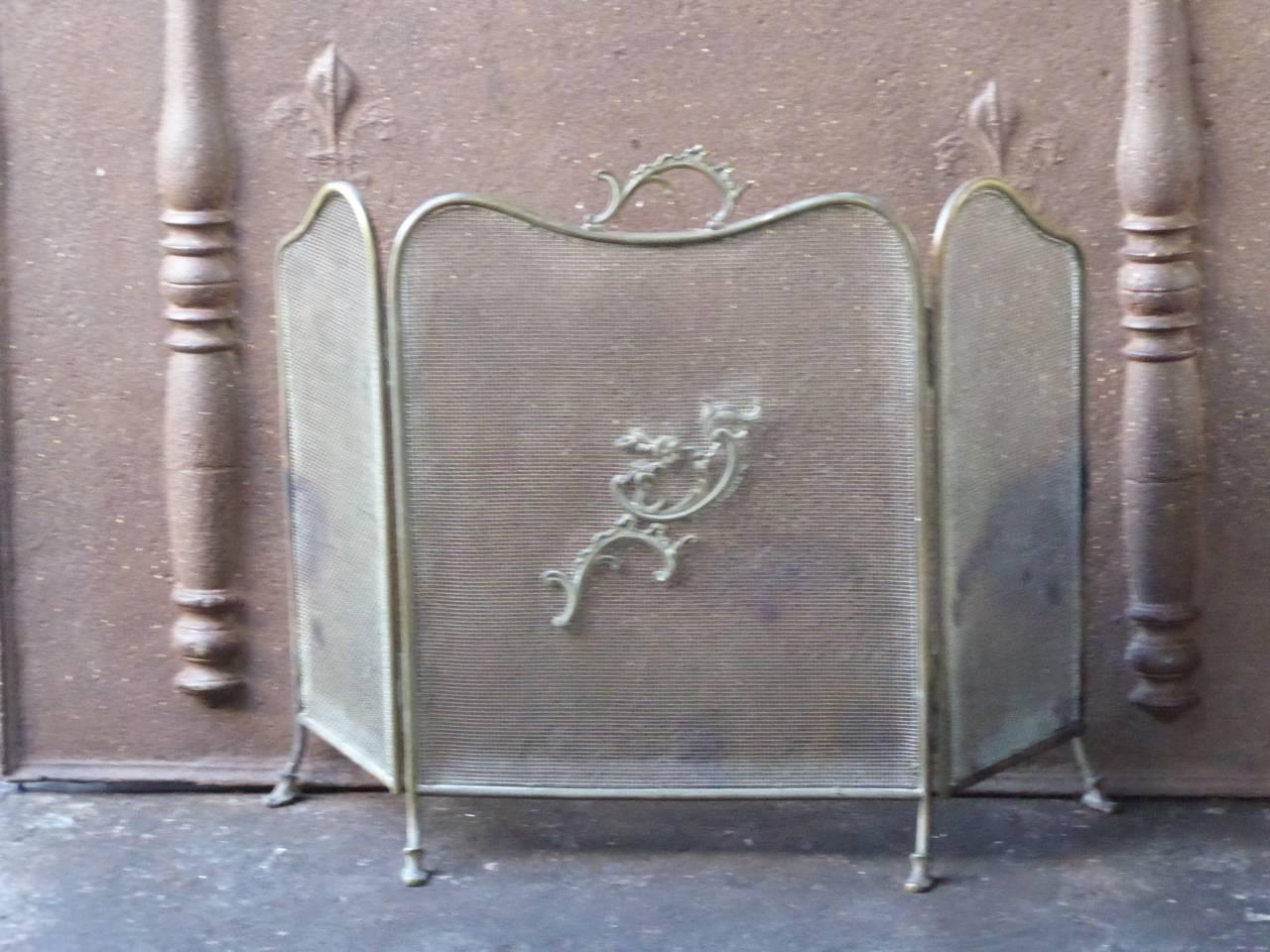 19th century English Victorian fireplace screen made of brass and iron mesh.

We have a unique and specialized collection of antique and used fireplace accessories consisting of more than 1000 listings at 1stdibs. Amongst others, we always have 300+