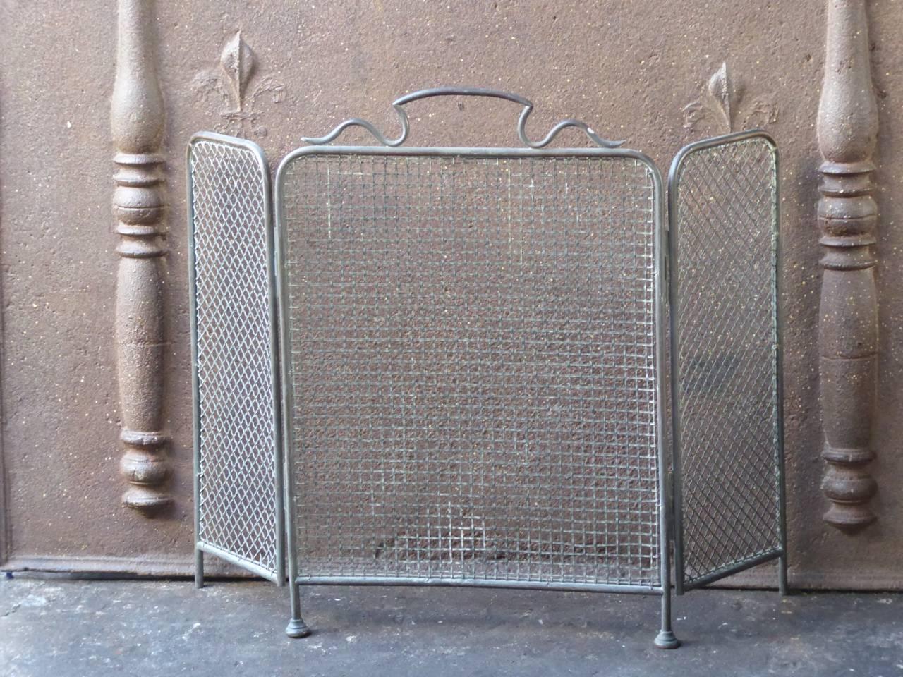 19th century English Victorian fireplace screen made of brass and iron mesh. The screen has three panels.

We have a unique and specialized collection of antique and used fireplace accessories consisting of more than 1000 listings at 1stdibs.