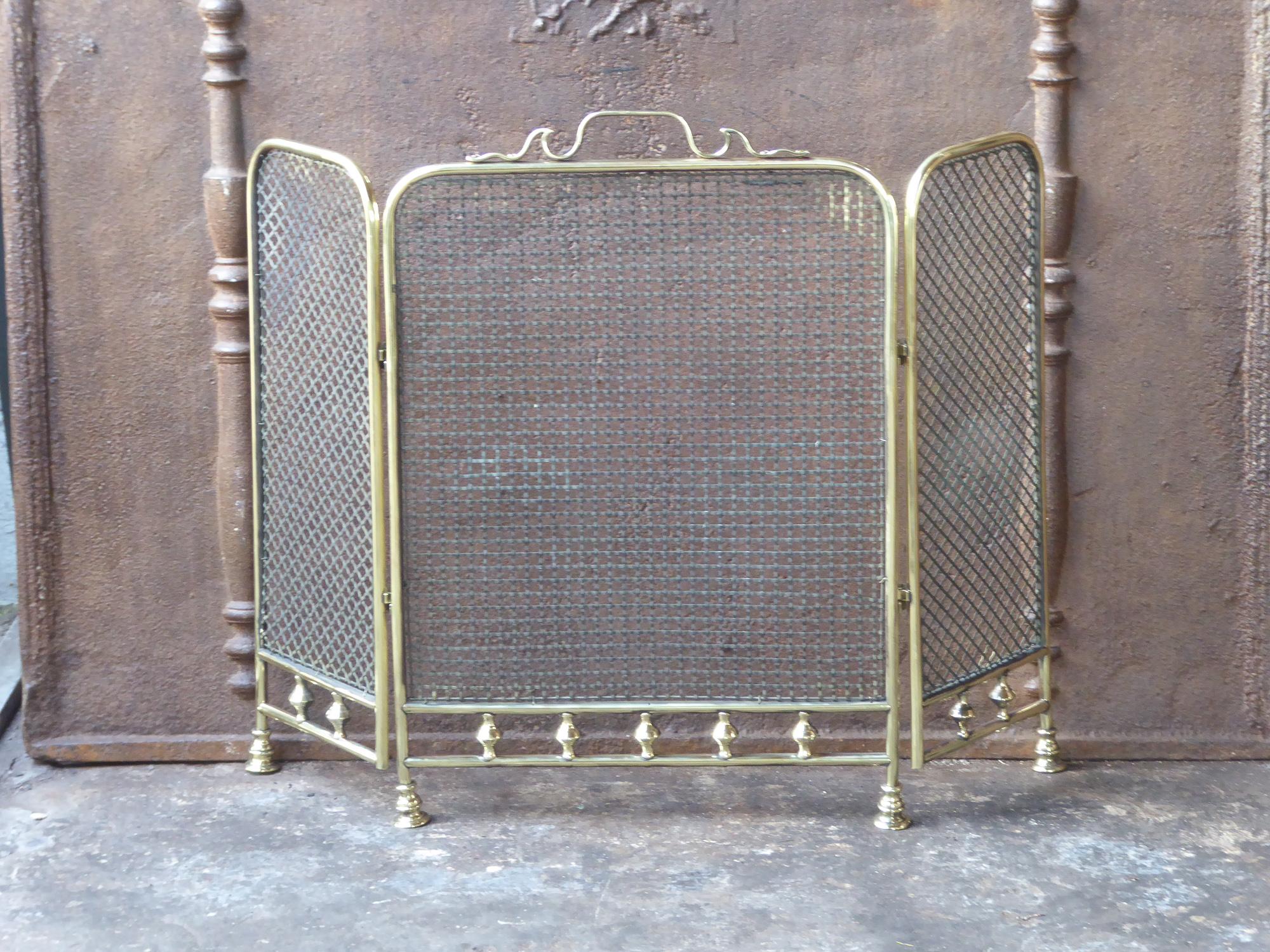 19th century English Victorian fireplace screen made of polished brass and iron mesh.

We have a unique and specialized collection of antique and used fireplace accessories consisting of more than 1000 listings at 1stdibs. Amongst others we always