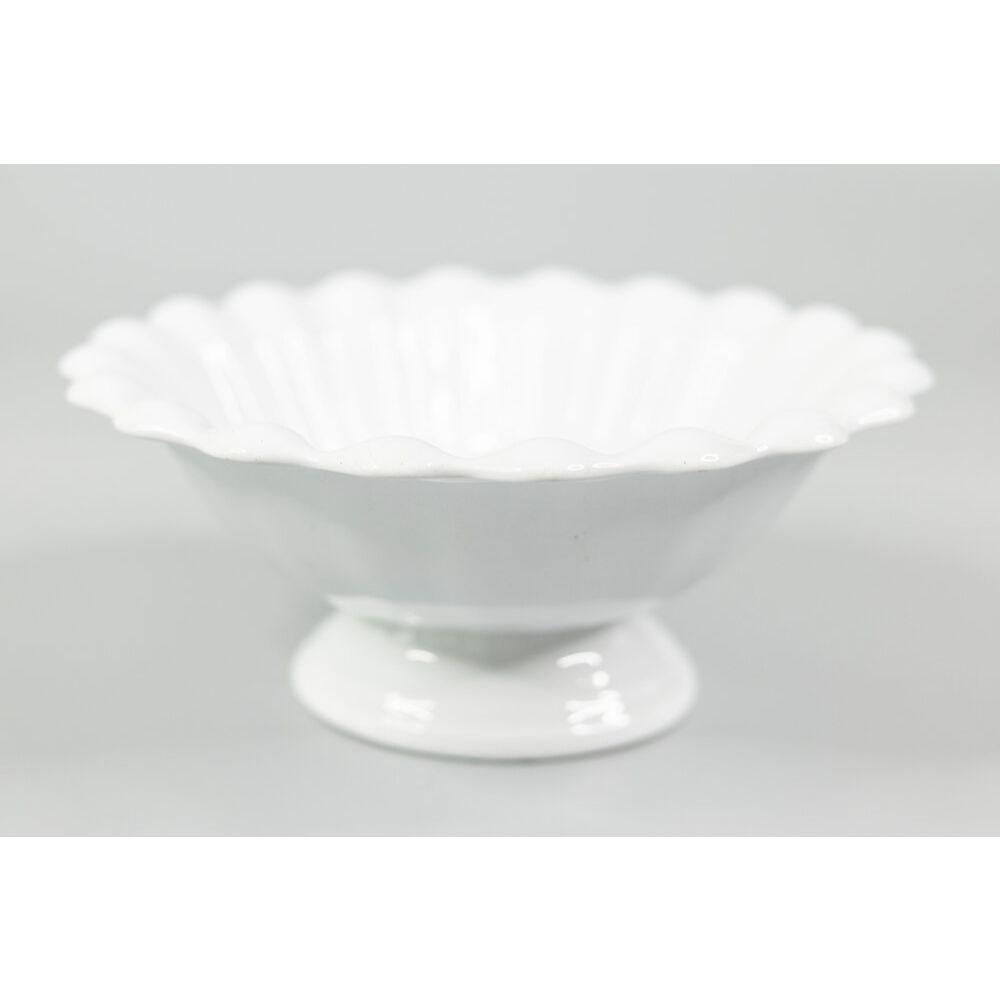A beautiful antique English white ironstone footed bowl with a lovely fluted design by Edward Clarke Tunstall, circa 1865. Maker's mark on reverse. This would be a wonderful addition to an ironstone collection and would look fabulous filled with