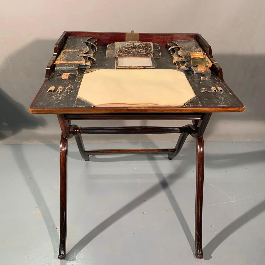This really is an oustanding quality and condition c19th English Campaign writing table by the very well respected and documented maker, Finnigans Ltd of Manchester, circa 1860.
Campaign furniture was always made to the very highest standards, but