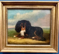 19th century English Folk Art  portrait of a seated King Charles Cavalier dog