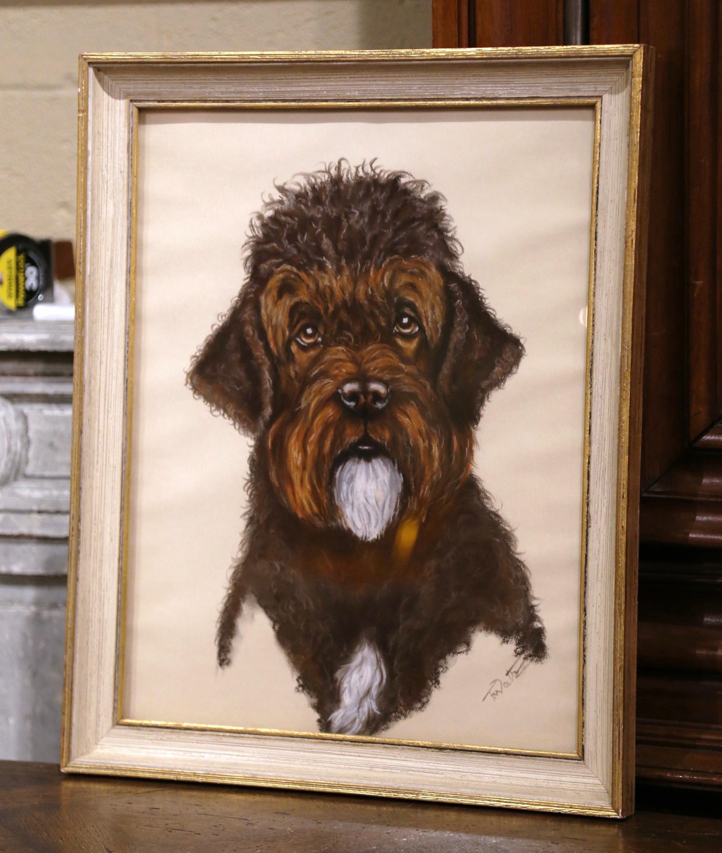 Decorate an office or a den with this elegant framed dog painting. Created in England circa 1880, and set in the original carved frame, the drawing depicts a cocker spaniel poodle mix portrait. The artwork is signed in the lower right corner by the