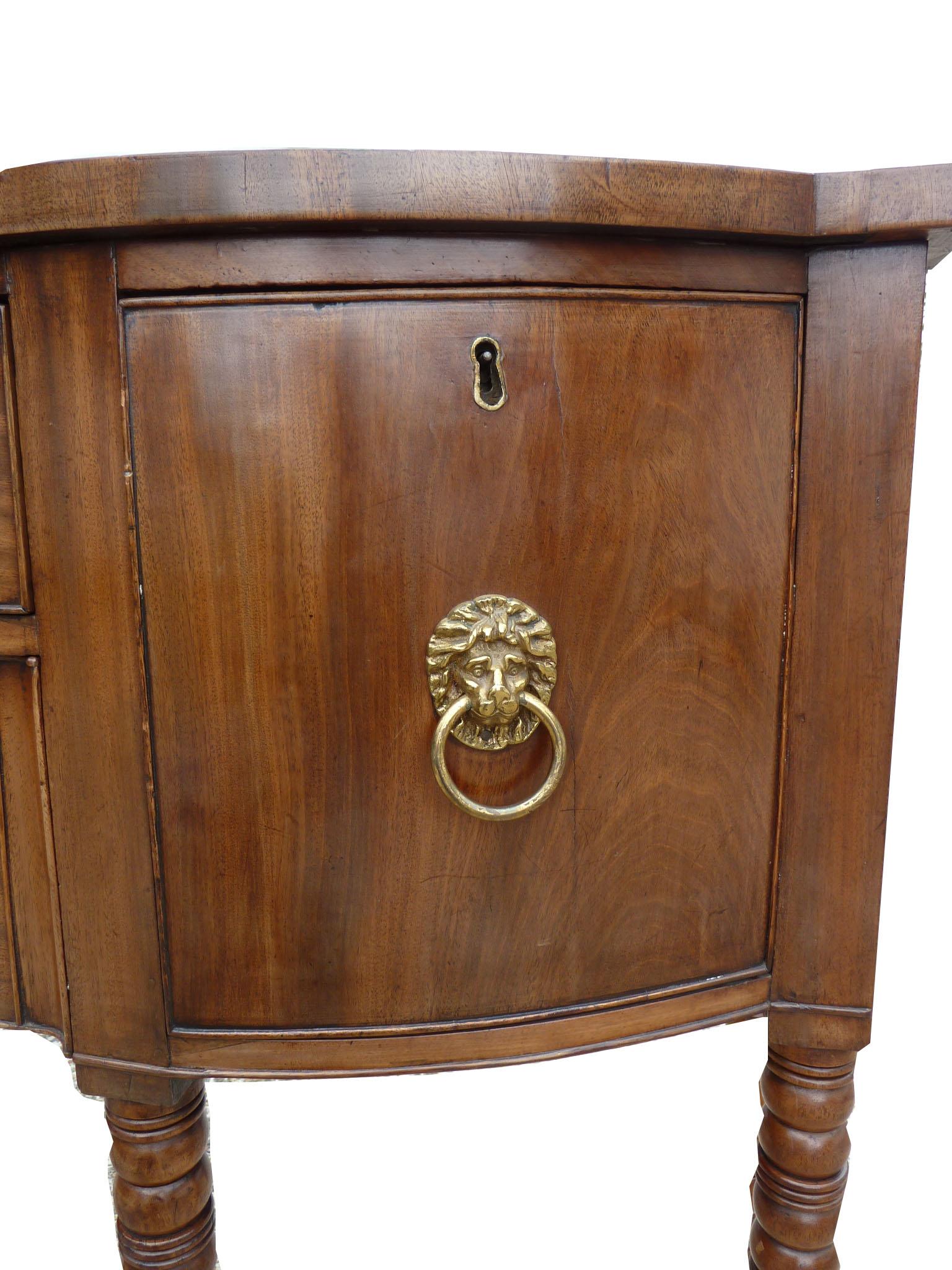 For sale is a good quality George III mahogany sideboard of small proportions. The sideboard has four drawers, each with original brass handles. The sideboard stands on 6 elegant turned legs. This piece is in a good untouched condition though there
