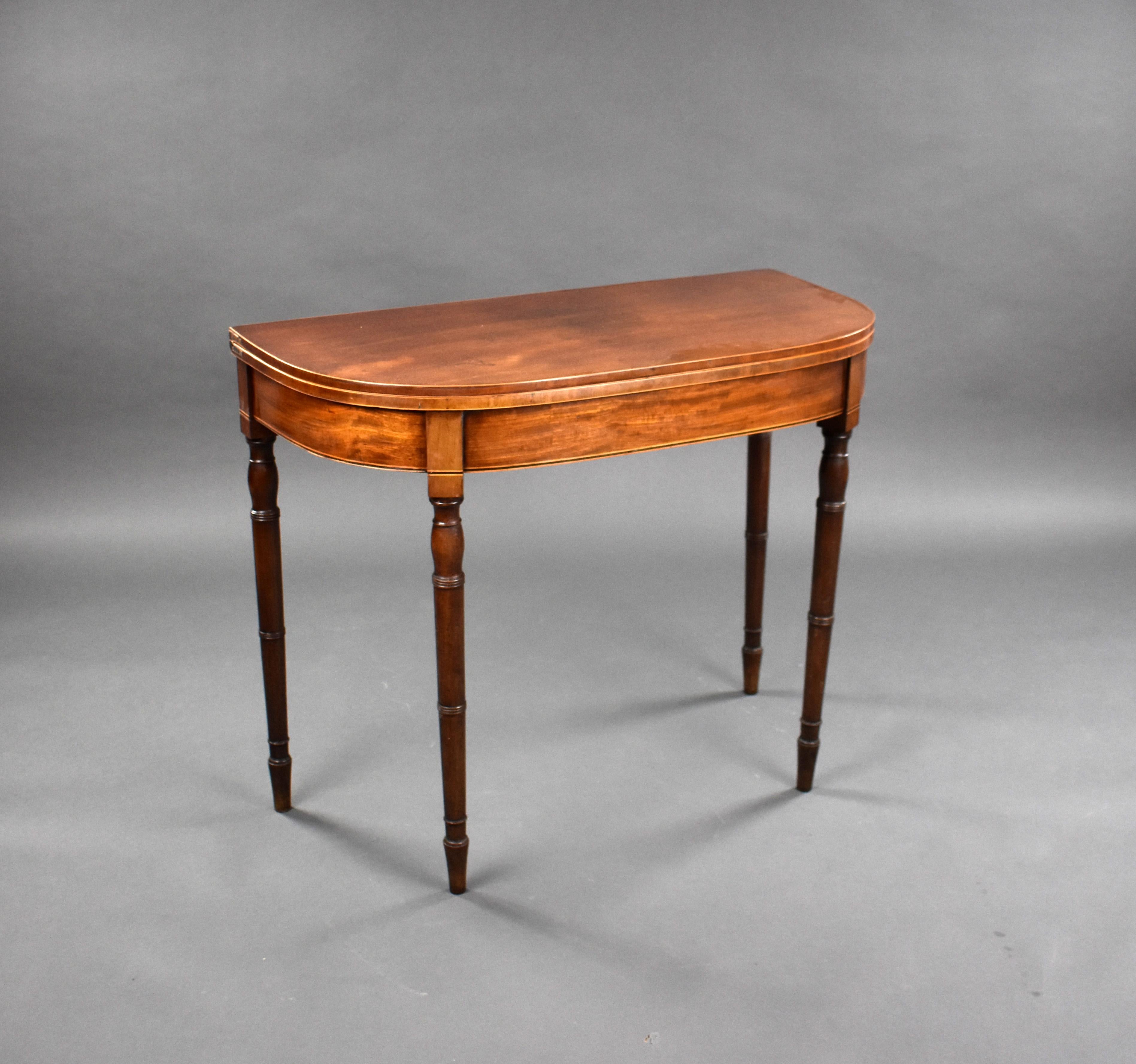 For sale is a George III mahogany tea table, having a fold over top and standing on elegantly turned legs, the table remains in good condition showing light wear commensurate with age and use. 

Measures: width: 92 cm depth: 45 cm height: 74 cm.