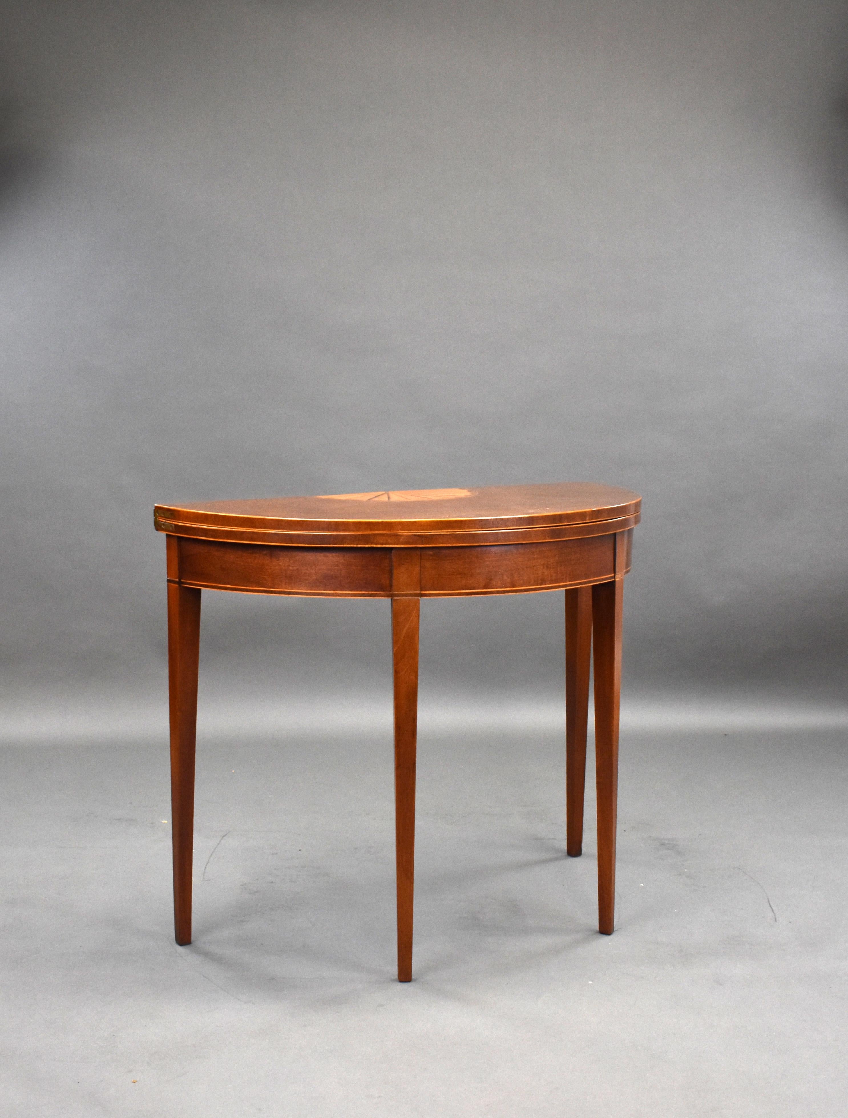 For sale is a George III Mahogany tea table, having a shell inlay to the top, opening out to make a circular table, standing on tapered legs. The card table is in very good condition for its age. 

Measures: Width: 92cm Depth: 46cm Height: 75.5cm.