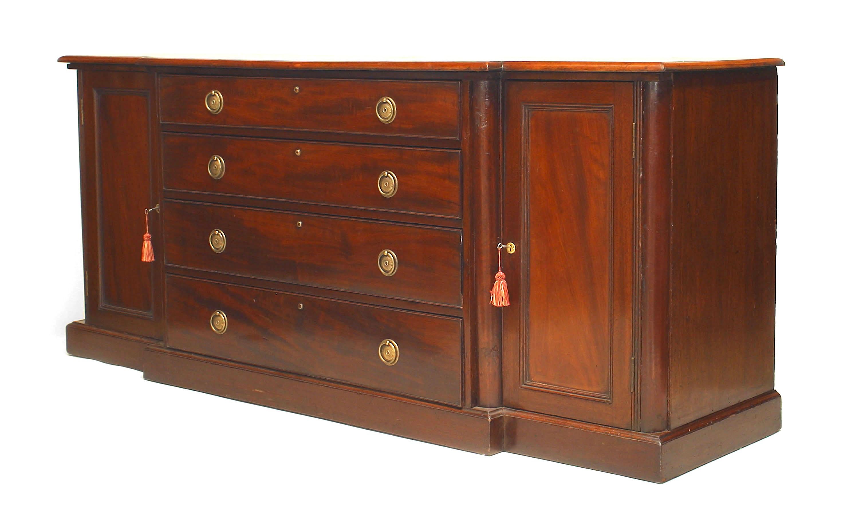 English Georgian style (19th century) mahogany sideboard with two doors flanking a breakfront centered group of drawers with a banded inlaid top.