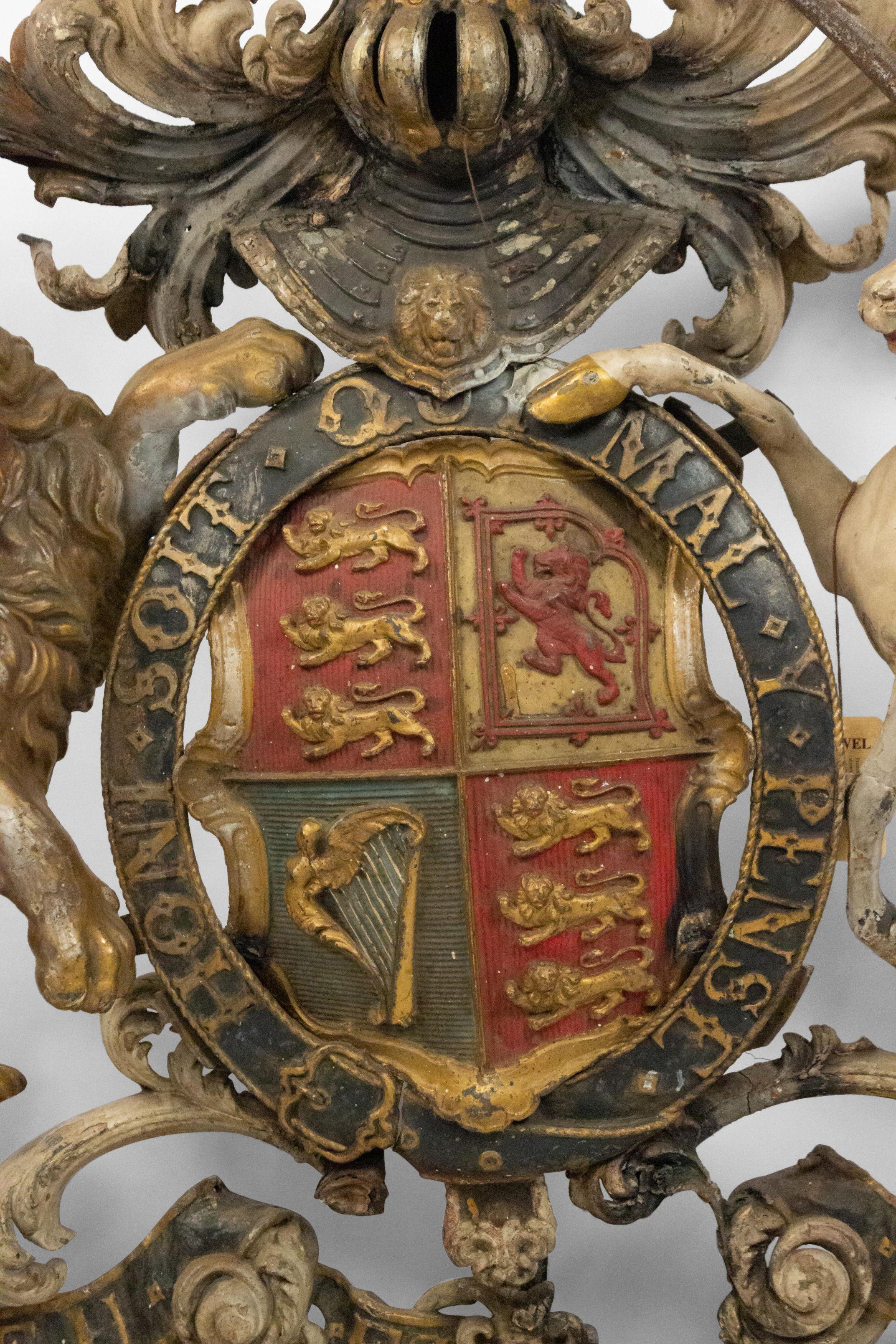 Armoiries en fer de style géorgien anglais (19e siècle) avec licorne et lion.